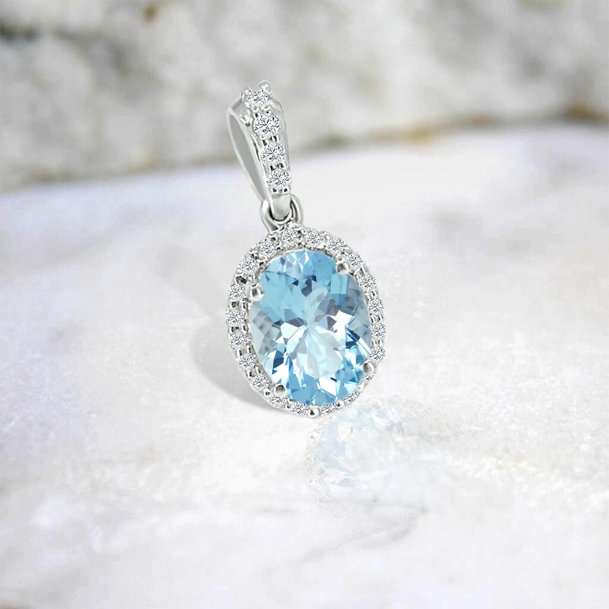 This Gorgeous Gemstone And Diamond Pendant Features A 8x6mm Oval Shaped Aquamarine Stone That Is Surrounded By Brilliant Cut Round Diamonds In Halo Fashion.
This Pendant Is Settled In 14k White Gold. You Will Love Wearing This Beautiful Aquamarine