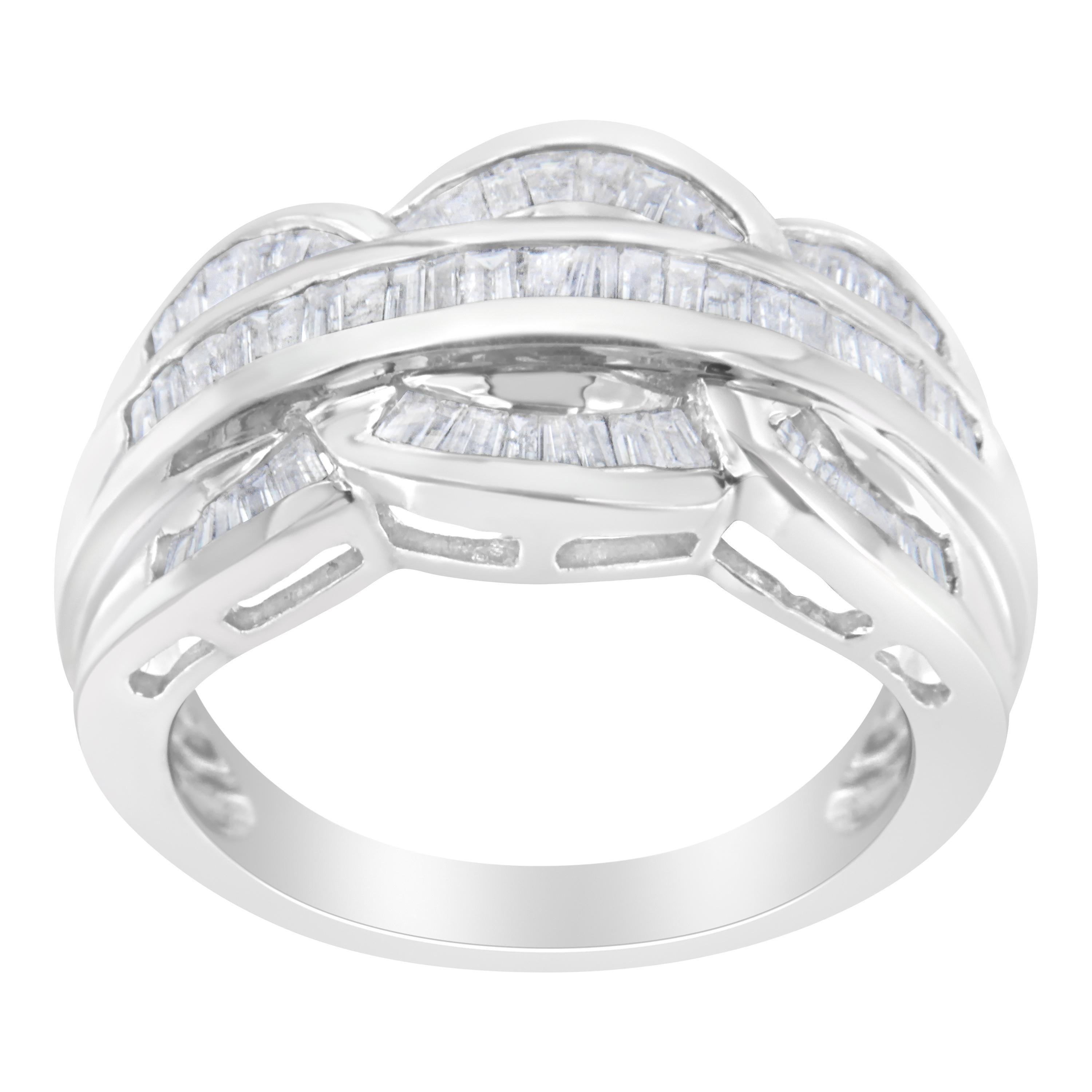 This 14 karat white gold band features three rows of baguette diamonds with an elegant arched design. The stylish ring has a total diamond weight of 1 1/2 carats. This is a rare one-of-a-kind piece, and will be a unique addition to your jewelry