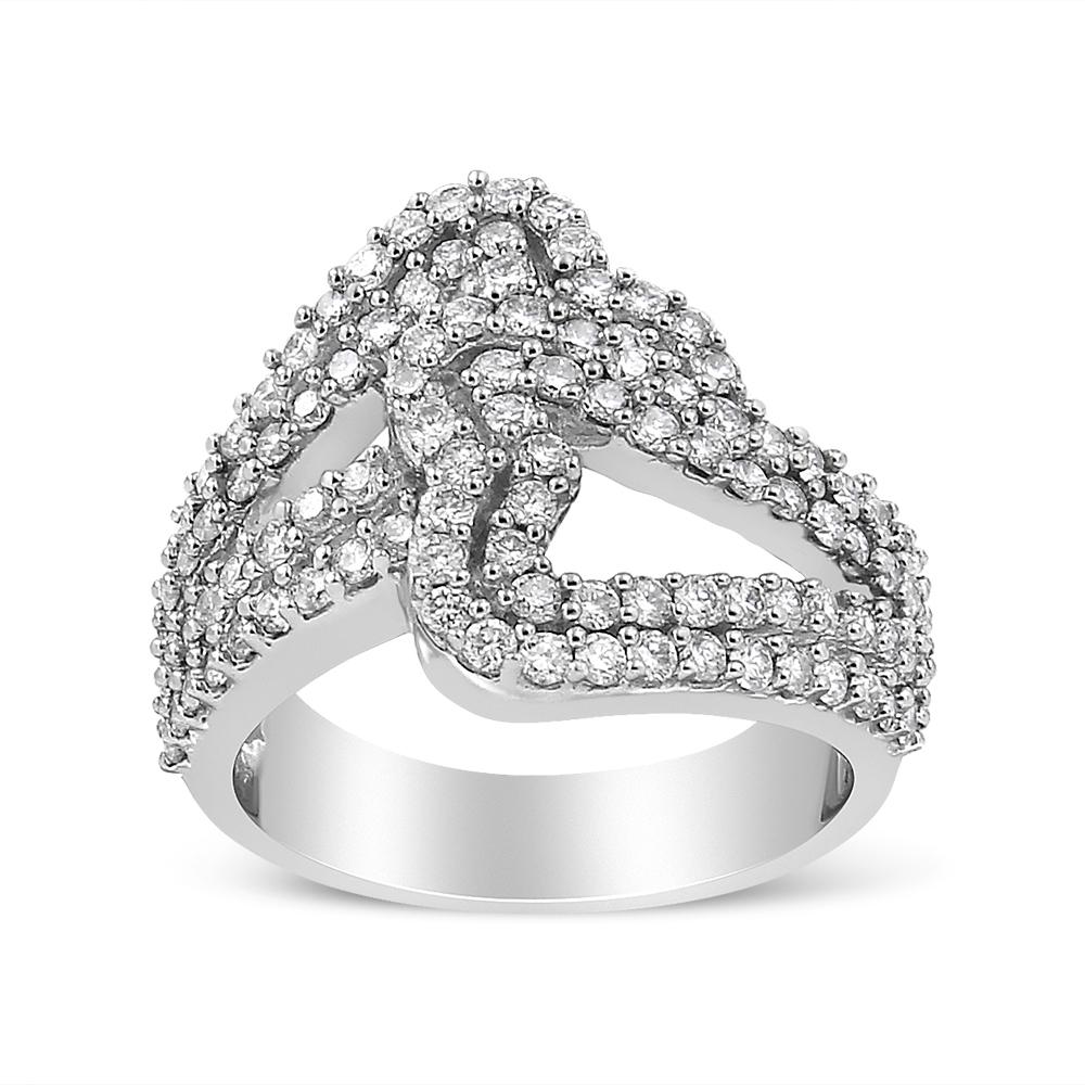 Glamourous and elegant, this stunning bypass ring has an interlocking double heart design that stands out. This piece is crafted in 14k white gold, a metal that is tarnish-free for years to come, and embellished with natural, round-cut diamonds.