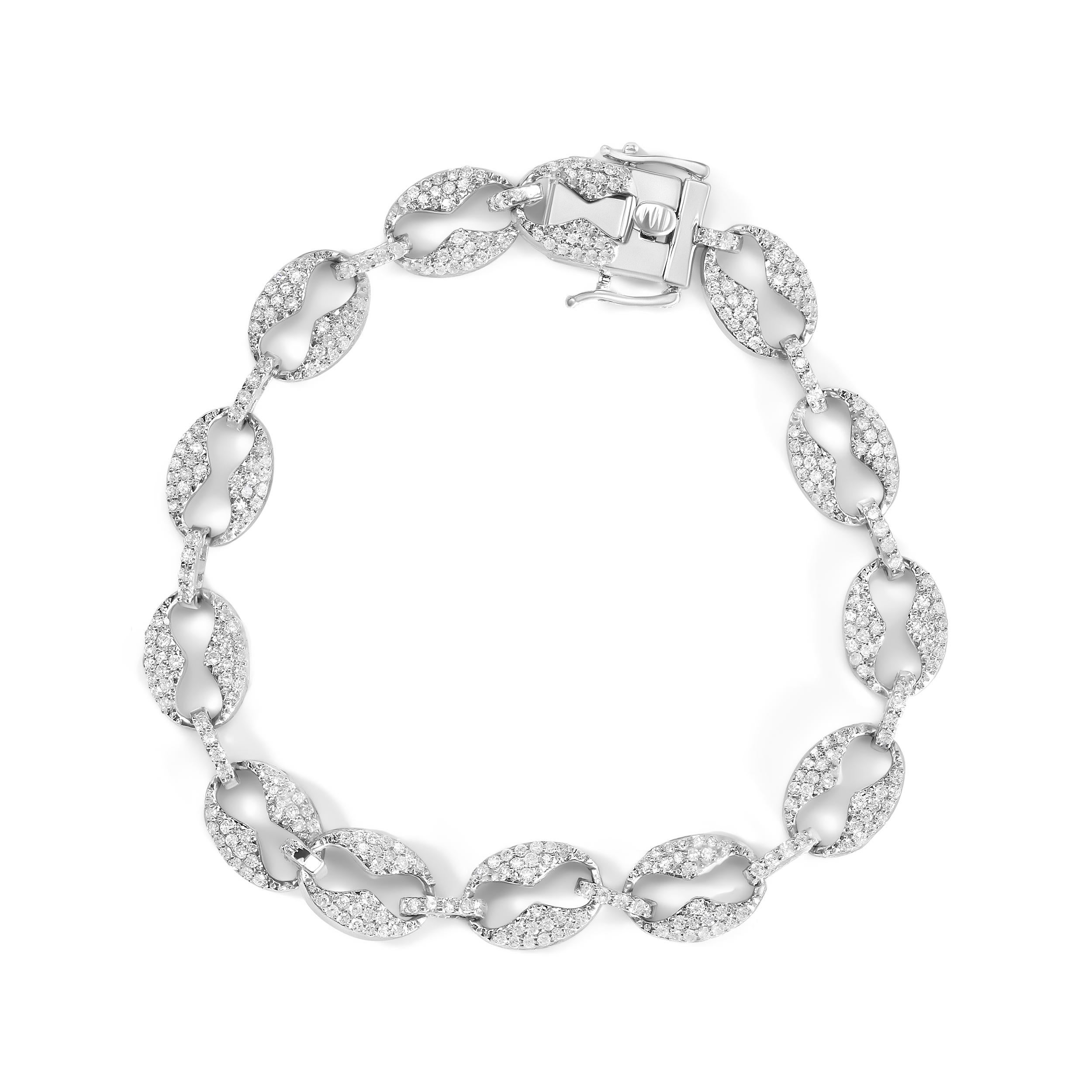 Schmücken Sie sich mit der exquisiten Schönheit dieses diamantenen Gliederarmbands aus 14 Karat Weißgold. Das Armband enthält 360 natürliche Diamanten im Rundschliff mit einem Gewicht von 1,5 cttw, die mit ihrer Farbe I-J und ihrer Reinheit I1-I2