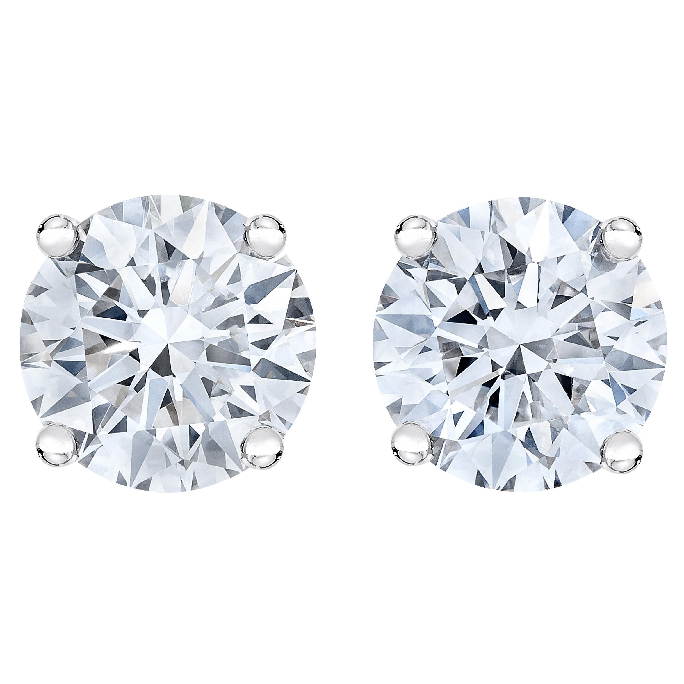 Clous d'oreilles solitaires en or blanc 14 carats avec diamants de 1 1/2 carat