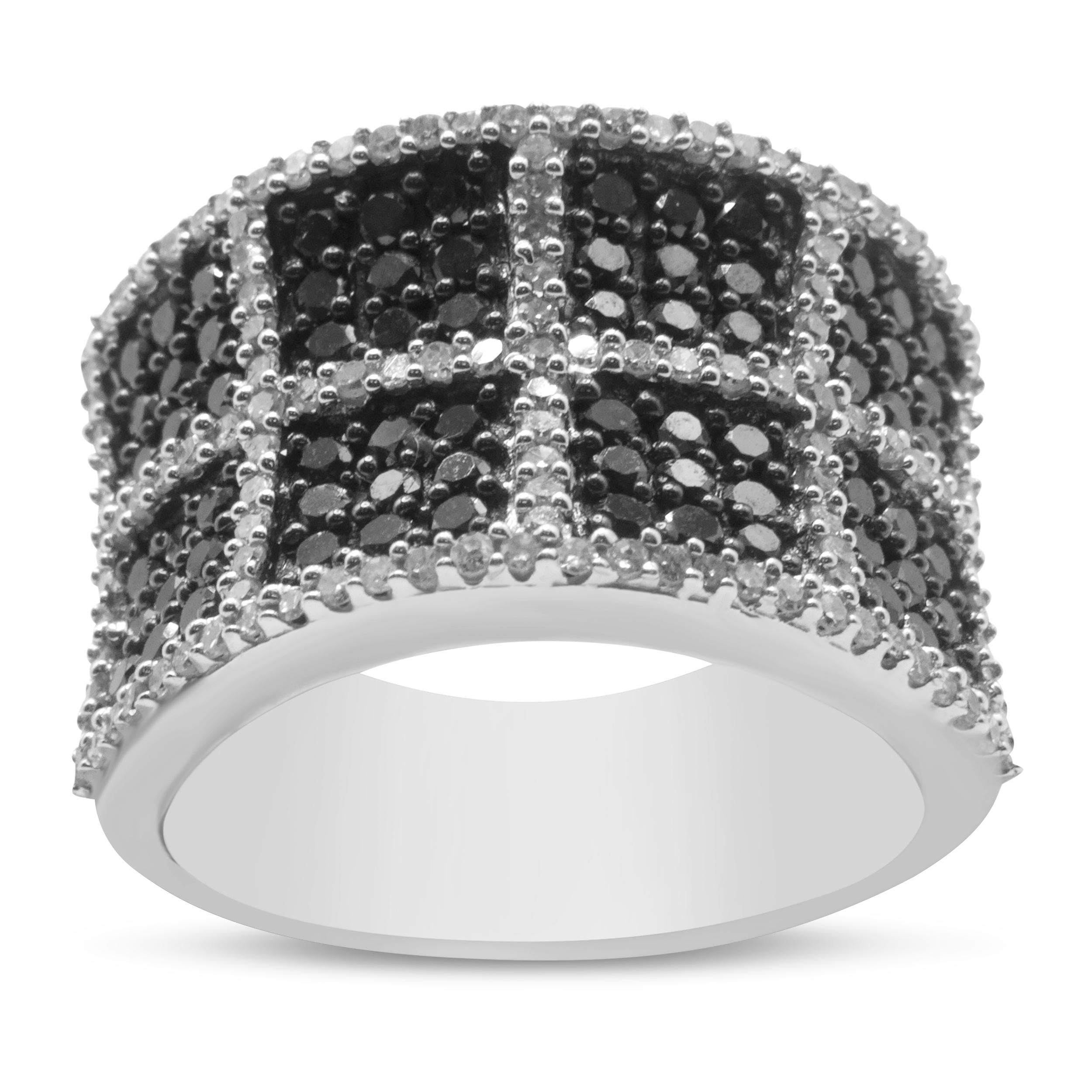 Bold and striking, this glamorous 1 1/2 cttw diamond cocktail ring will bring magnificent glamour to any outfit you wear! This stunning band is crafted in 14k white gold, a metal that will stay tarnish free for years to come. The design of this ring