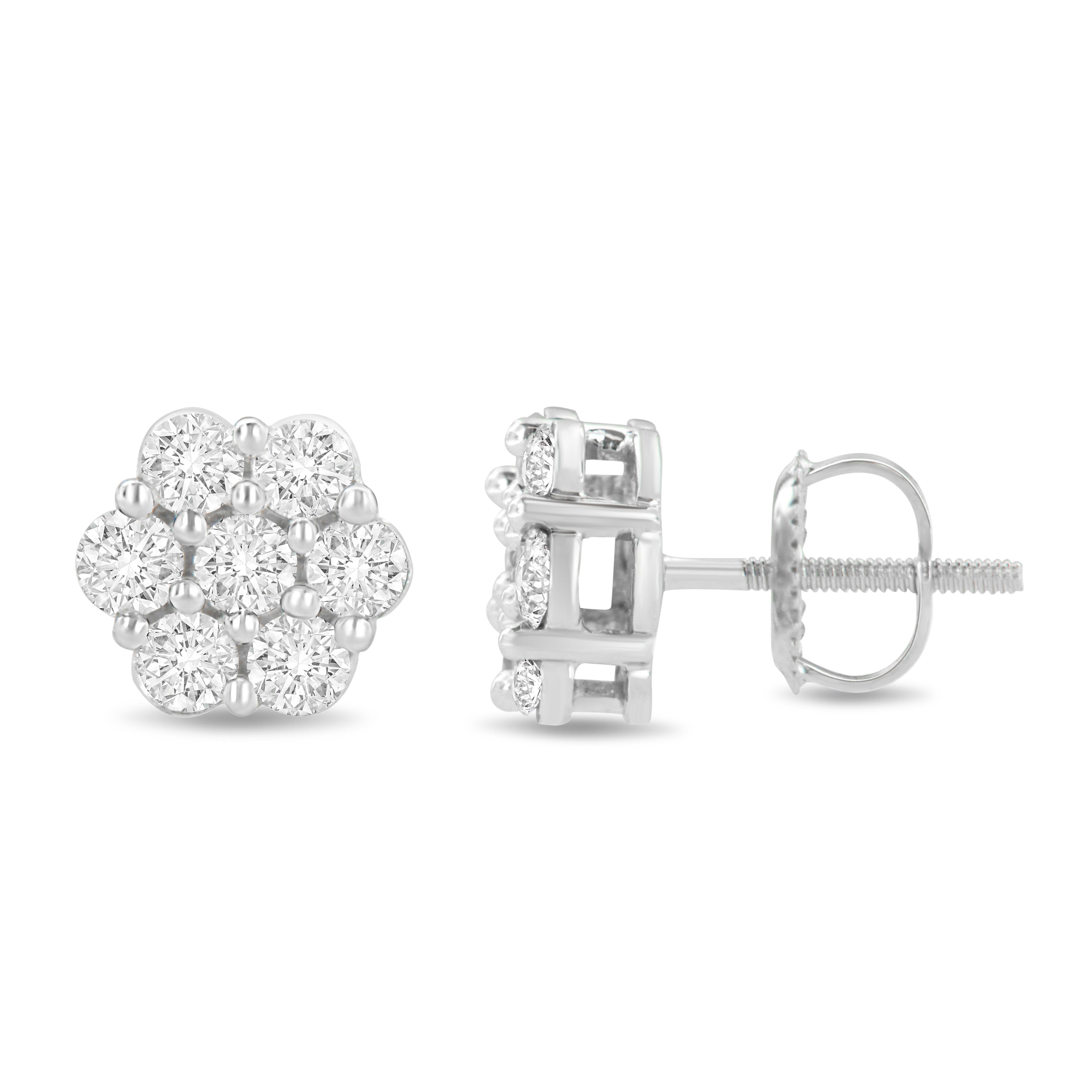 These gorgeous floral cluster studs are made with 7 round-cut diamonds each. Designed in the finest 14k white gold, these earrings are embellished with stunning round-cut, prong set diamonds. This piece boasts an impressive total diamond weight of 1