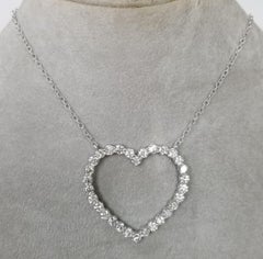 14 Karat White Gold Diamond Heart Pendant with 6.57 Carat of Diamonds