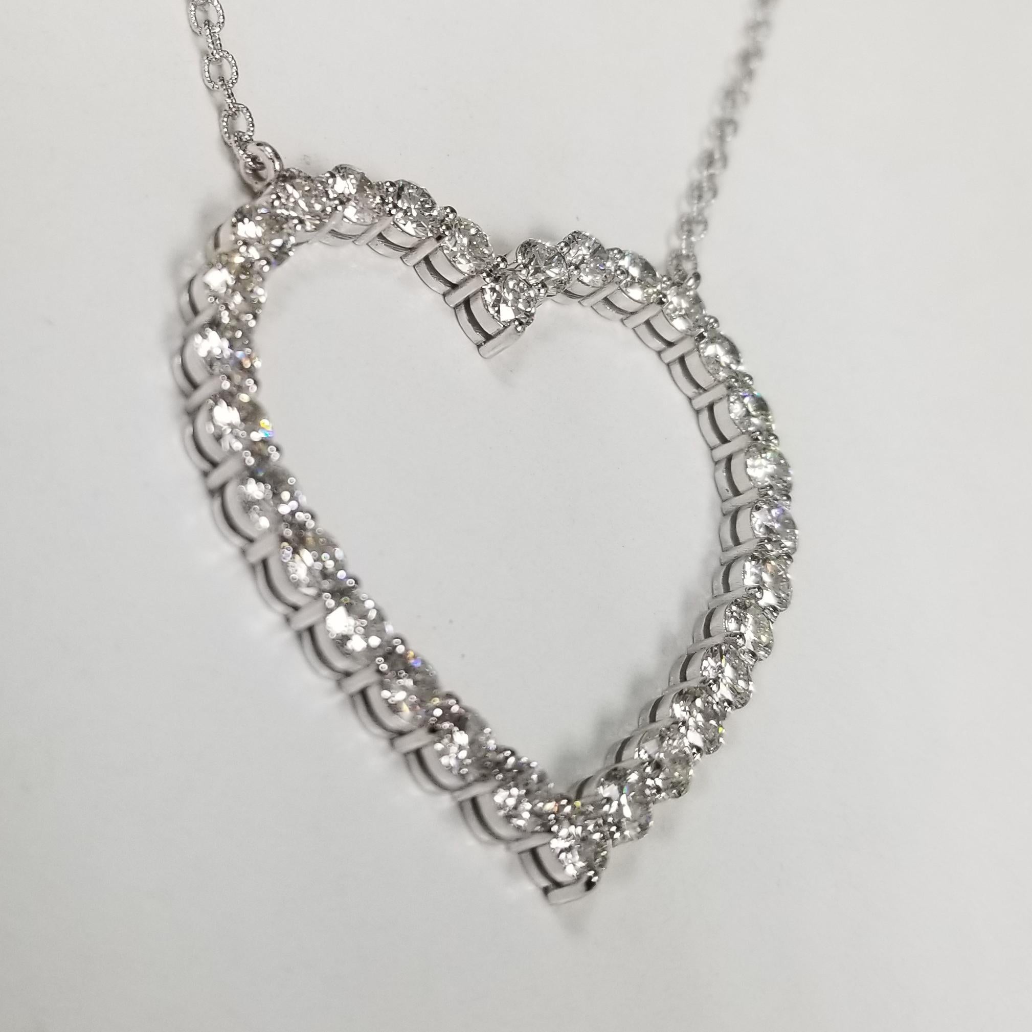 Round Cut 14 Karat White Gold Diamond Heart Pendant with 6.57 Carat of Diamonds For Sale