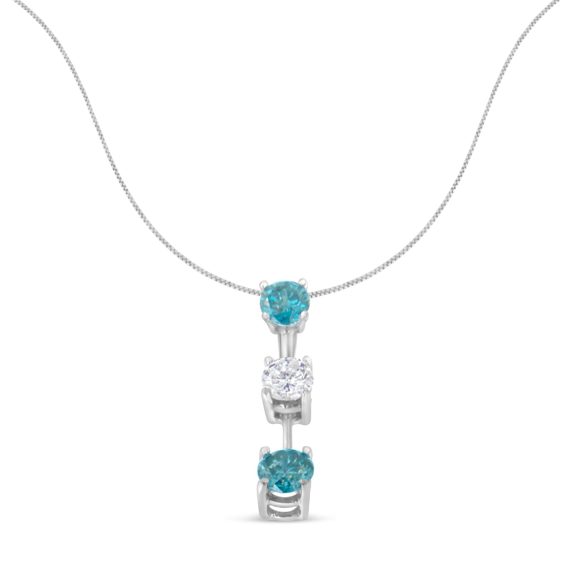Attractive in design, this alluring pendant will create a great look to any attire. Chisel to excellence, the pendant is crafted of luster 14 karats white gold and has a shiny appeal. Further, the ornamentation with white and treated blue round cut