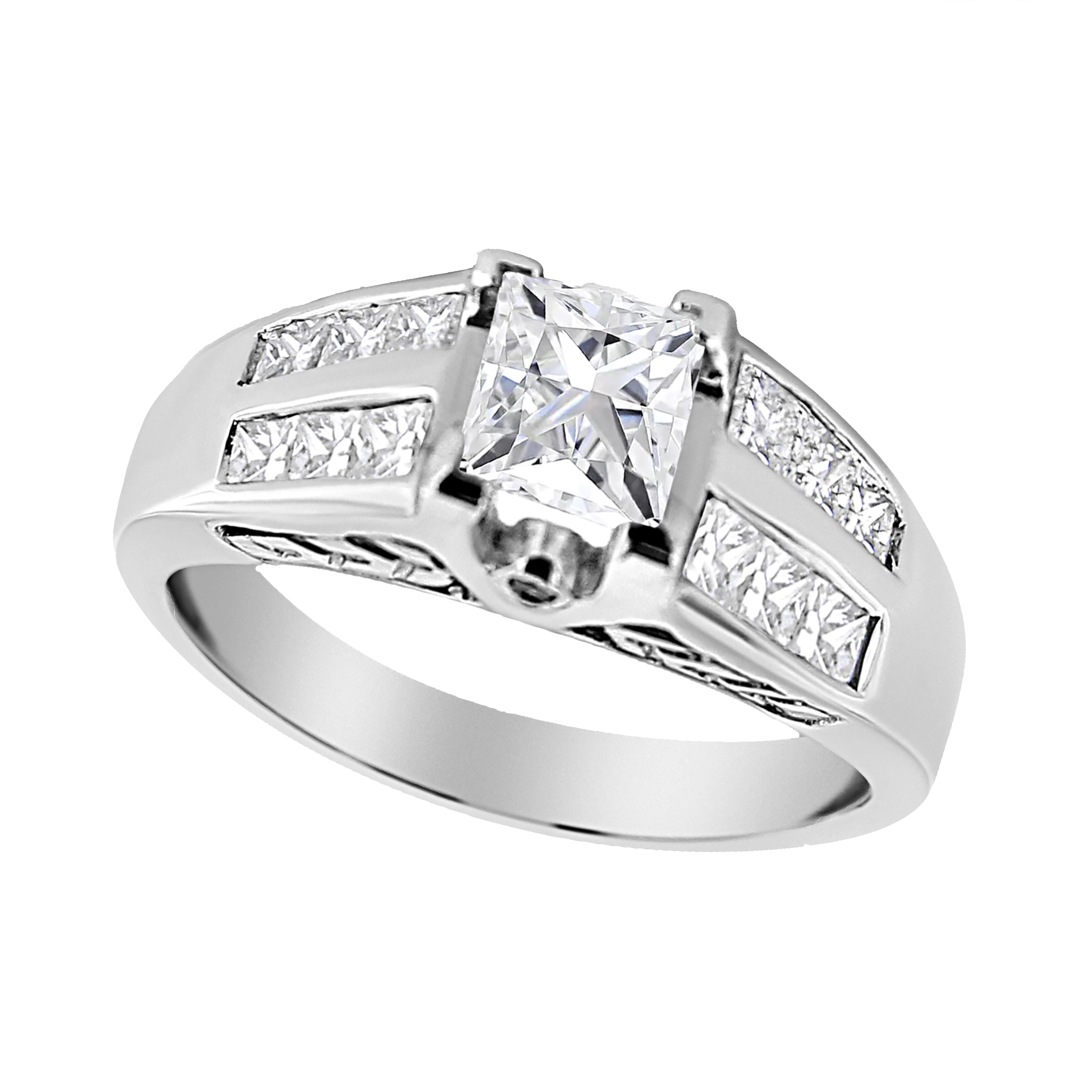 Adorn yourself with this bold 14k white gold ring. A sparkling 3/4 cttw princess-cut diamond sits at the center of this ring in a trendy invisible setting. The central stone is flanked by smaller princess and round-cut diamonds studded on the gold