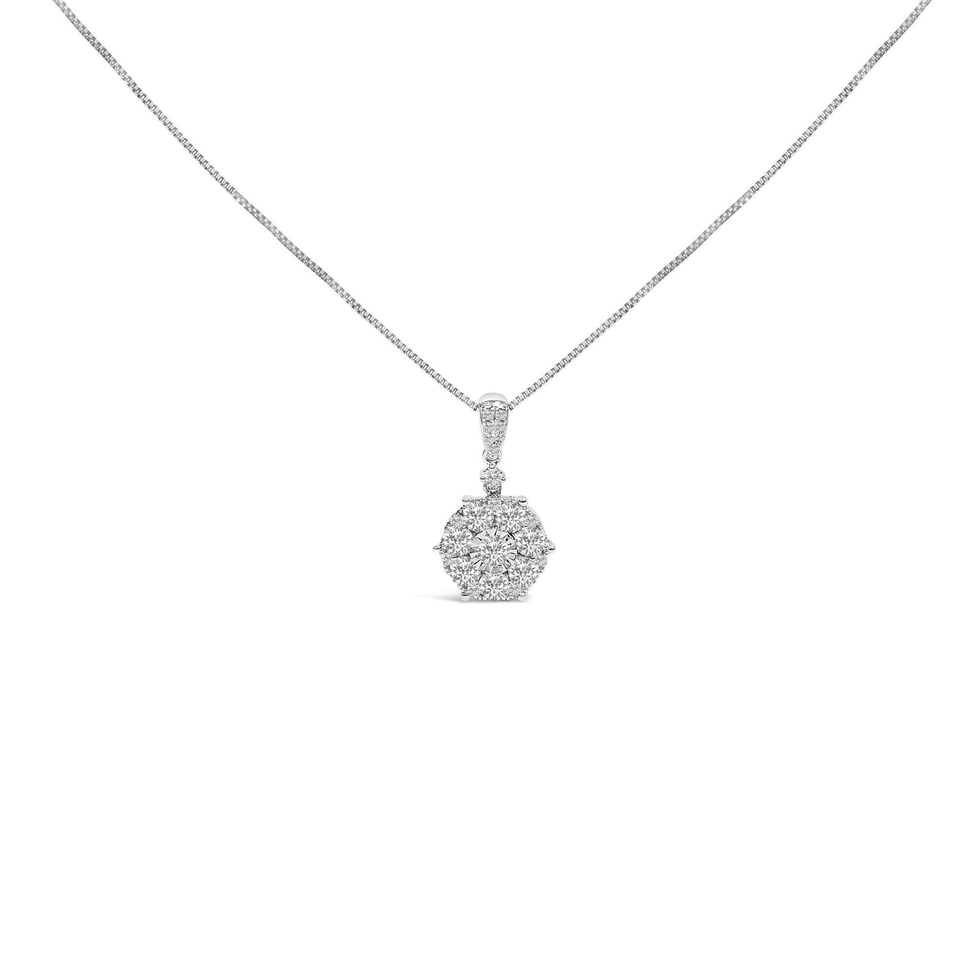 Discover the radiant elegance of this 14K white gold pendant necklace, where a cluster of natural diamonds dazzles irresistibly. Each stone, featuring an F-G color and VS2-SI1 clarity, sparkles with a pure, celestial light, painstakingly set in a