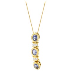 14k White Gold 1 1/5 Cttw Round-Cut Diamond and Tanzanite Pendant Necklace
