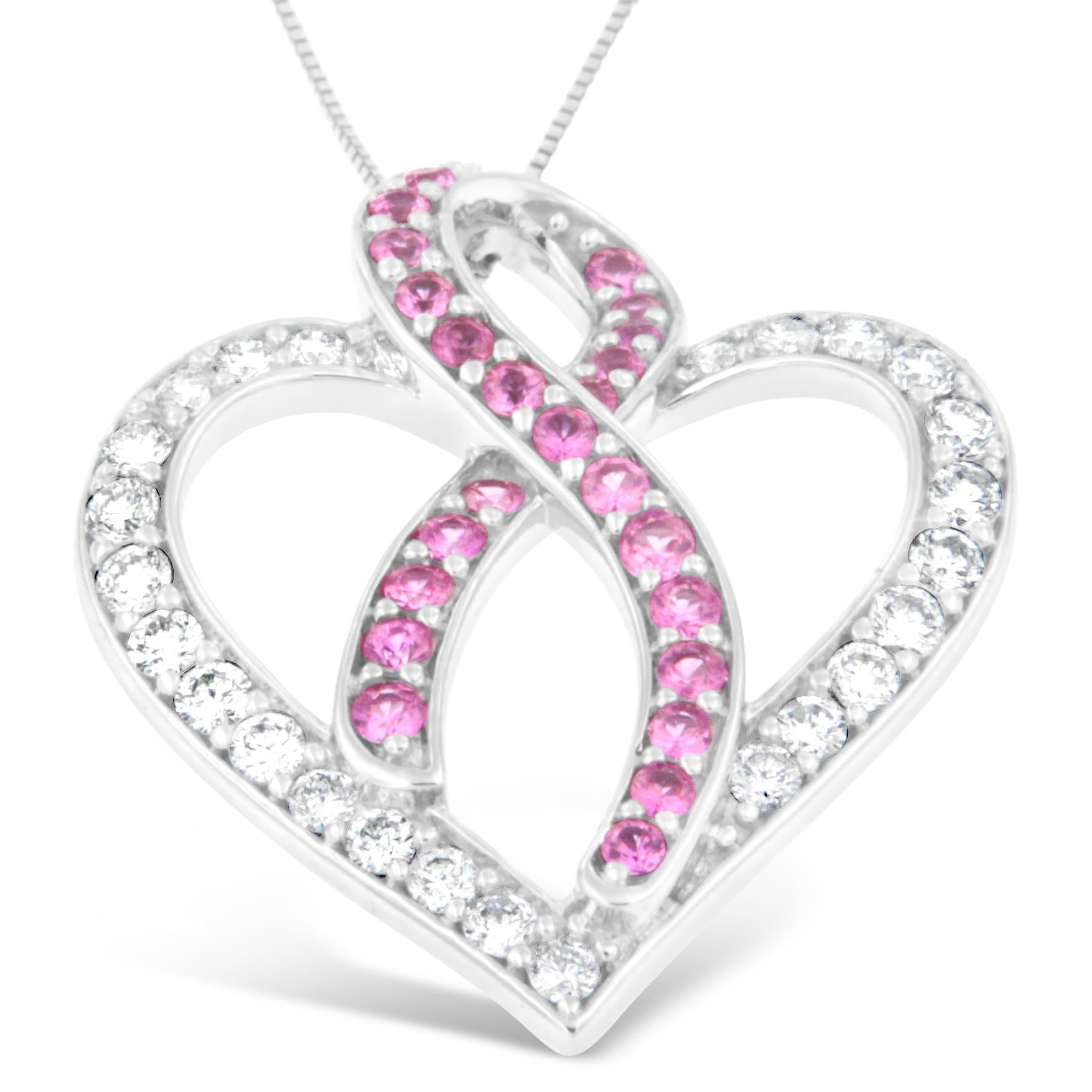 This romantic yet radiant necklace is suspended from 14 karats white gold. It is formed in the shape of an interwoven ribbon and heart. The lovely heart is embellished with sparkling round cut diamonds, and the ribbon design is decorated with