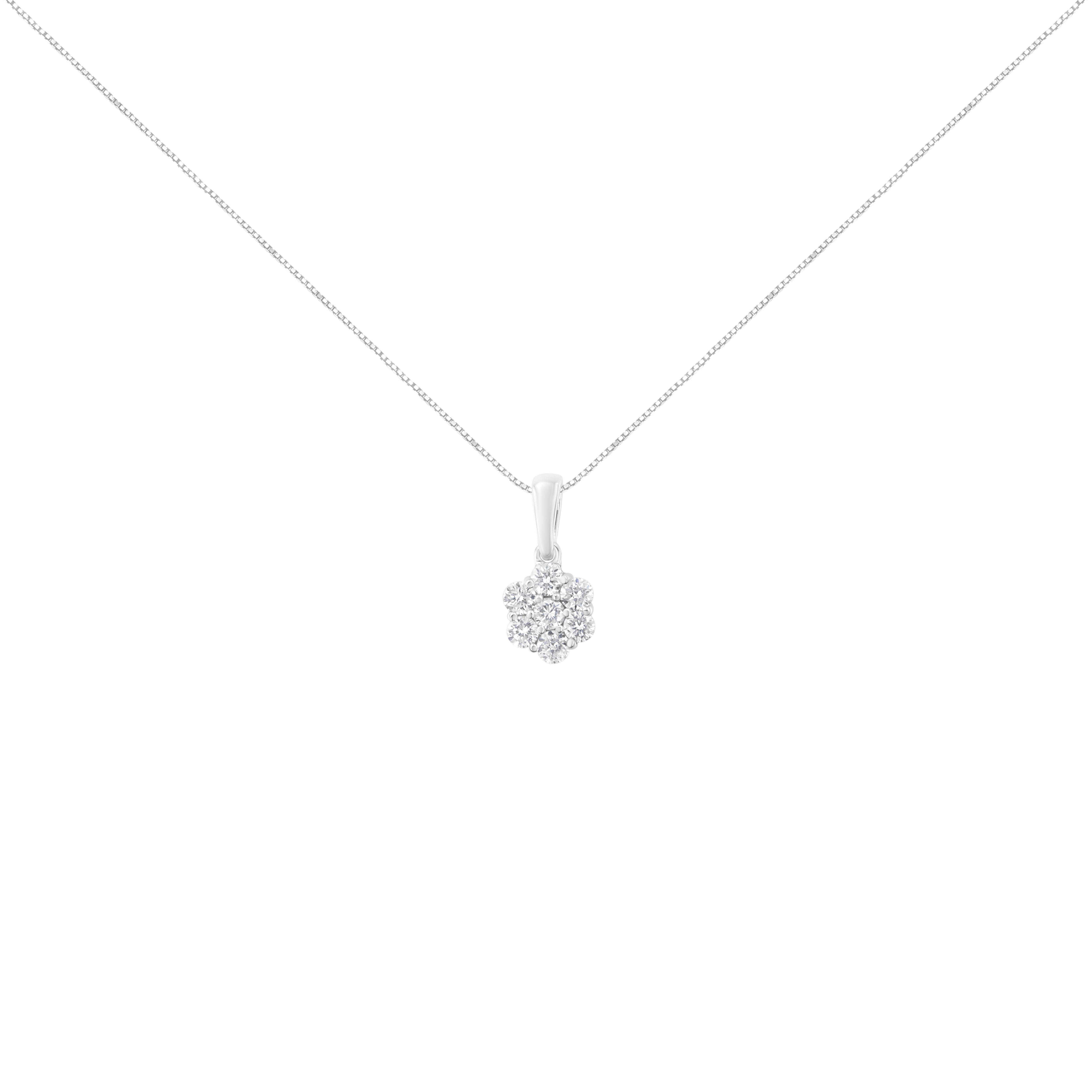This stunning floral cluster pendant is designed with 7, natural diamonds in a glistening prong setting. Designed in the finest 14k white gold, this necklace boasts 1/2 ct tdw. The diamonds have an H-I color grade and an SI2-I1 clarity grade. This