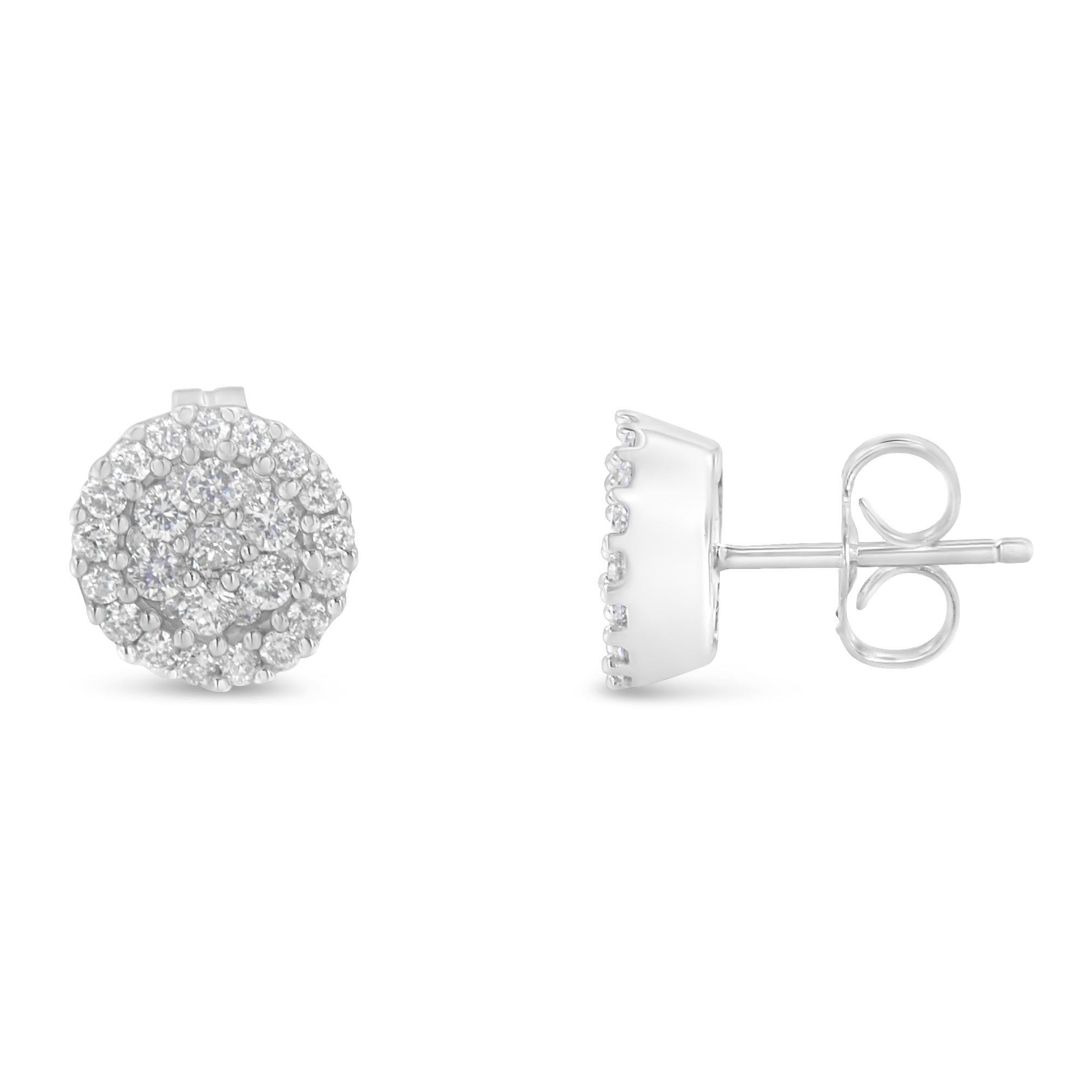 A stunning pair of gold and diamond stud earrings. These floral earrings are prong-set with 60 round-cut diamonds clustered together to create a magnificent diamond look. The diamonds, weighing a total weight of 1/2 carat, are set in lustrous 14k