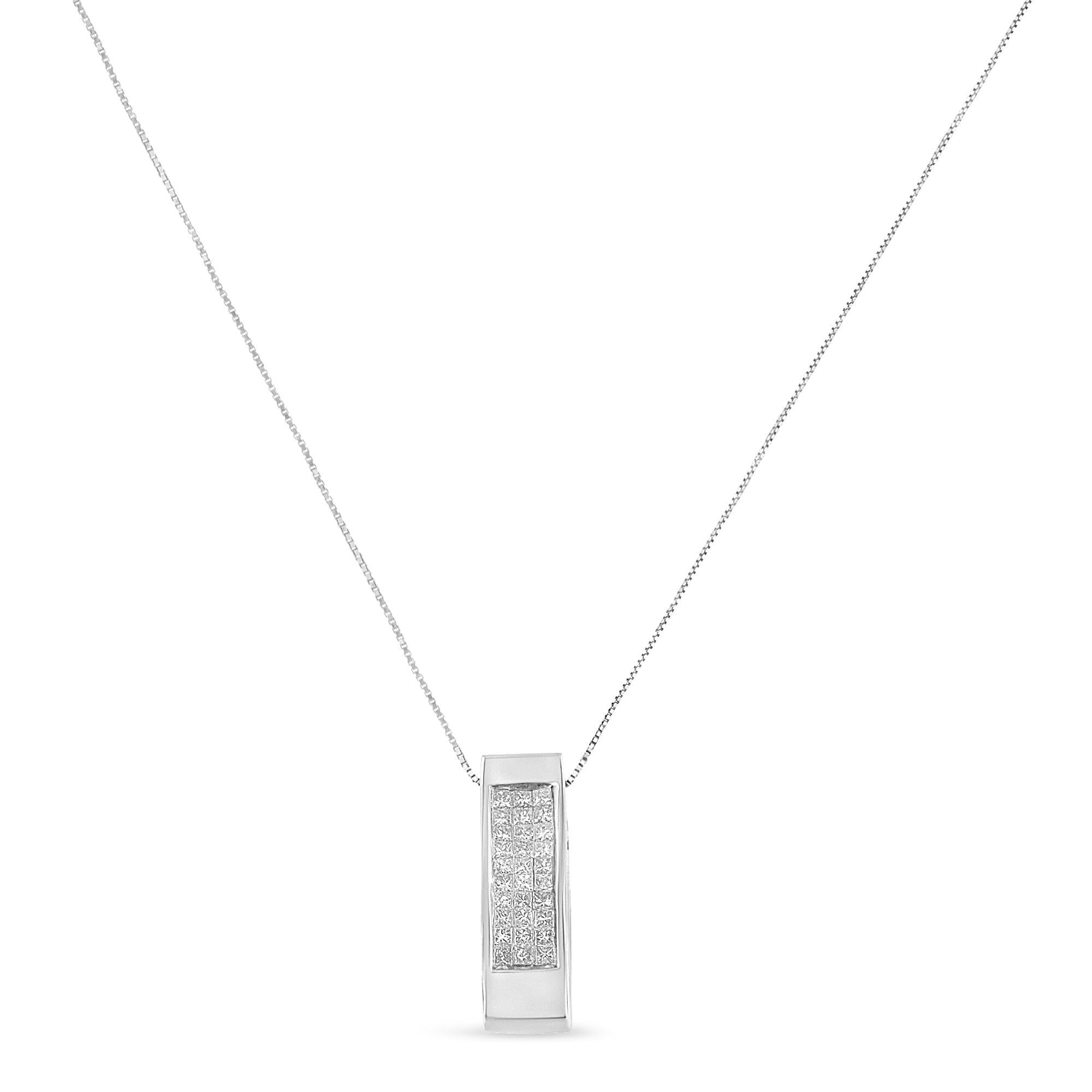 Created in a modern, contemporary design, this diamond vertical bar block pendant necklace radiates class and glamour. The minimalist bar block profile is juxtaposed by glamorous, linear princess cut diamonds in an invisible setting that perfectly