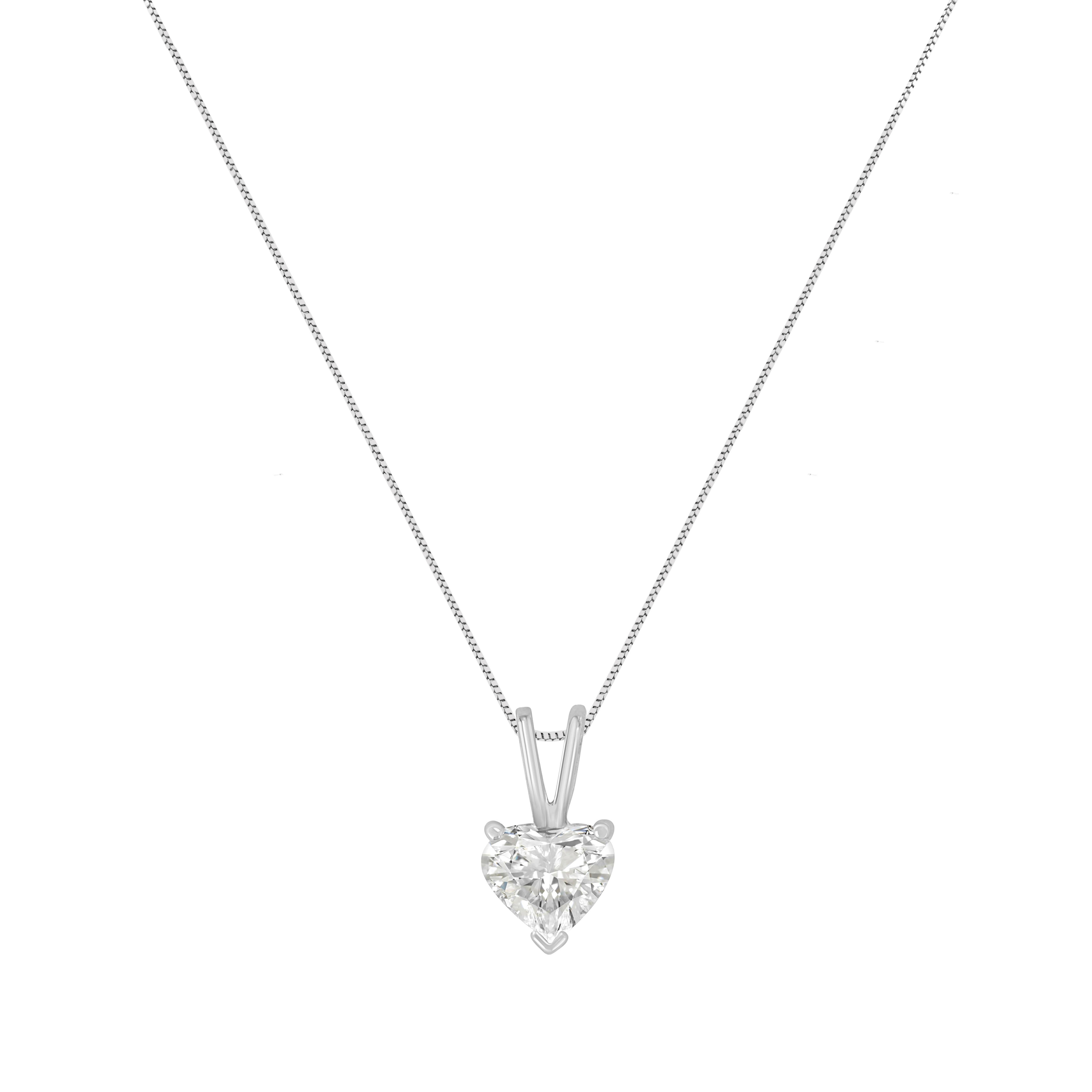 This elegant heart-shaped solitaire diamond is set in 14K white gold with an 18-inch cable chain that secures with a spring ring. A brilliantly cut heart shaped diamond emanates pure elegance and love in its gold setting. Goes with anything you care