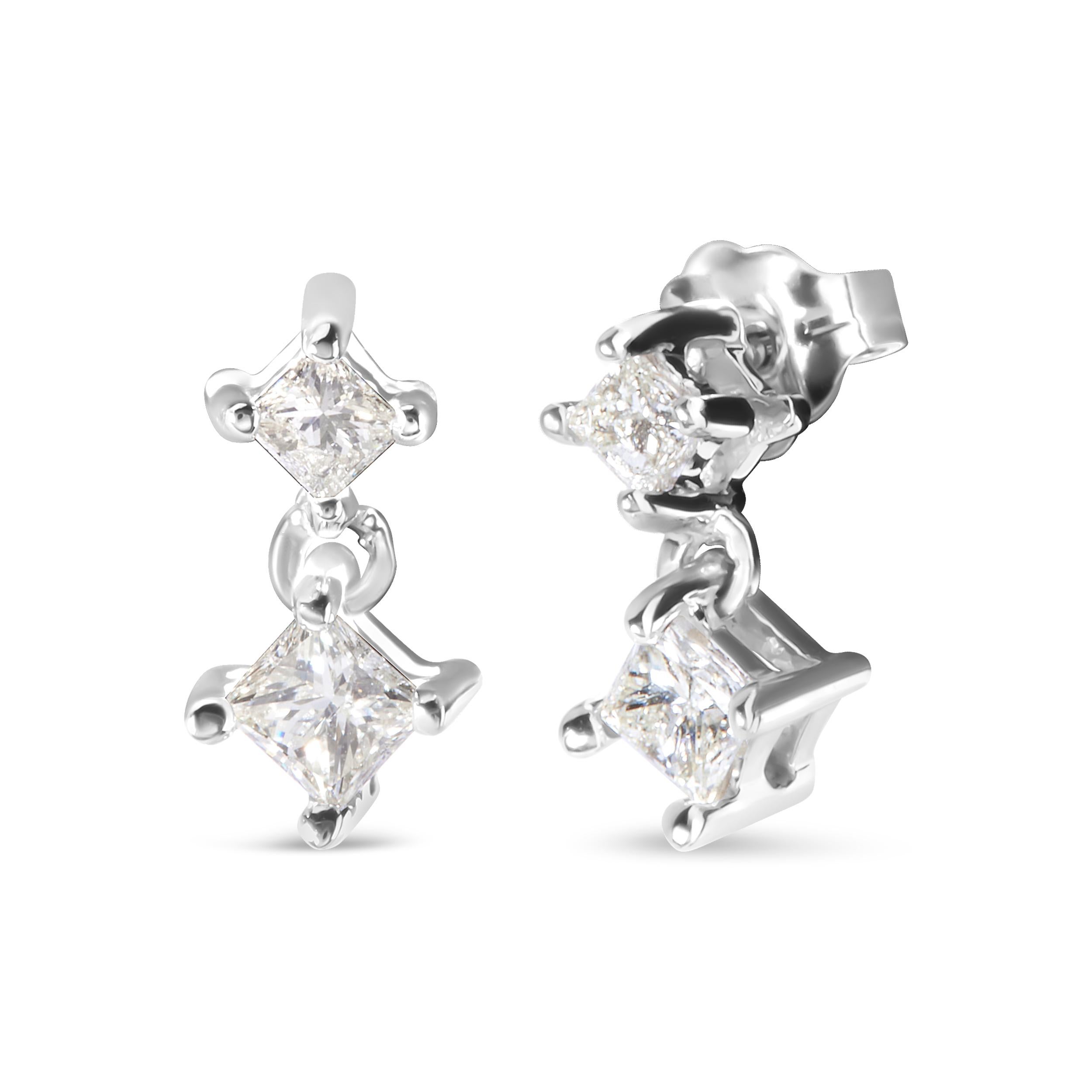 Lend some flair and edgy sparkle to your look with this classic pair of earrings. Designed with extreme precision and sophistication, the masterpiece is crafted of rich 14 karat white gold. Each of the pieces is beautified with prong set princess