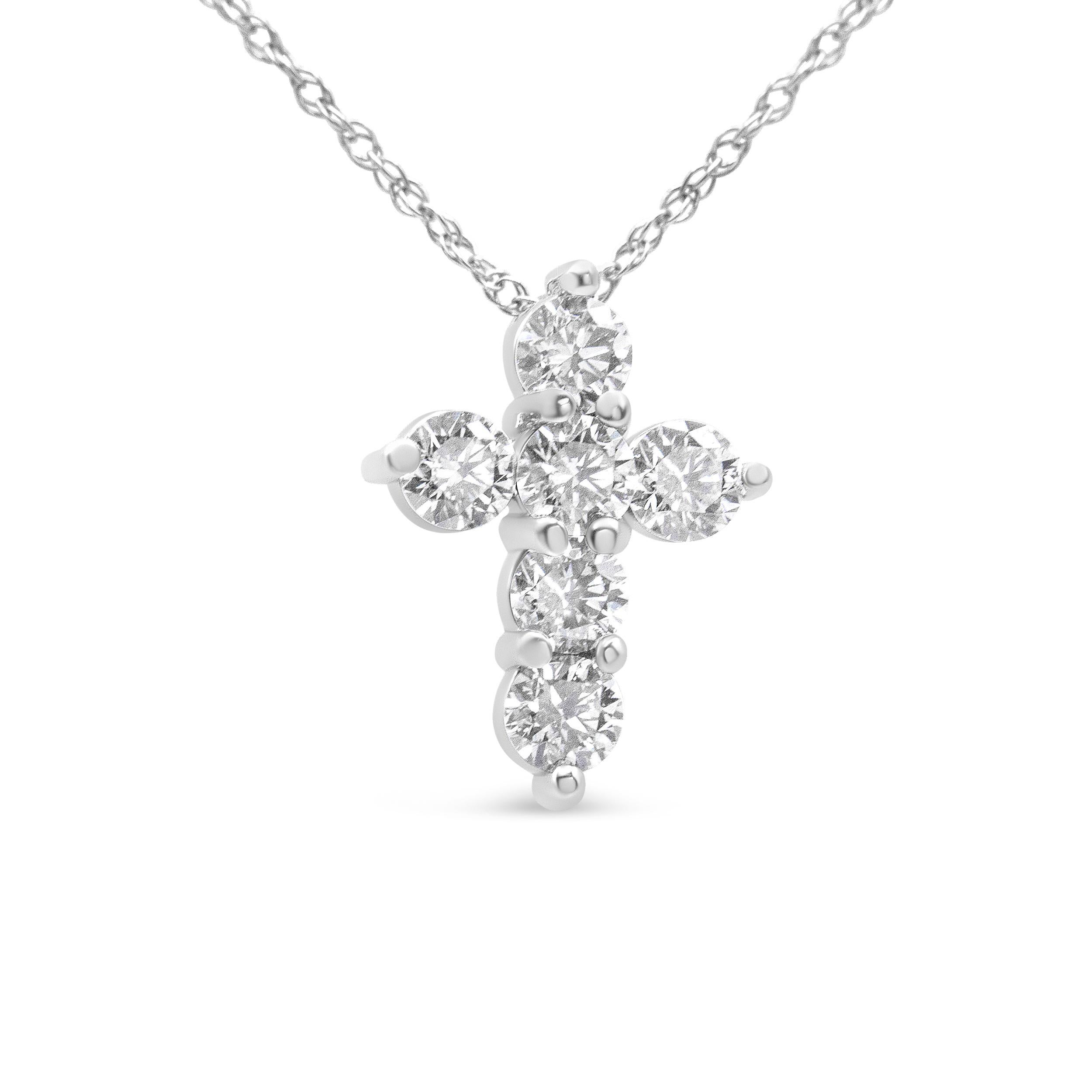 Showcase your inner devotion with this striking 1/2 c.t. diamond cross necklace. The pendant is crafted in 14k white gold, a metal that will stay tarnish free for decades to come. The cross motif is embellished with 6 sparkling, natural round-cut