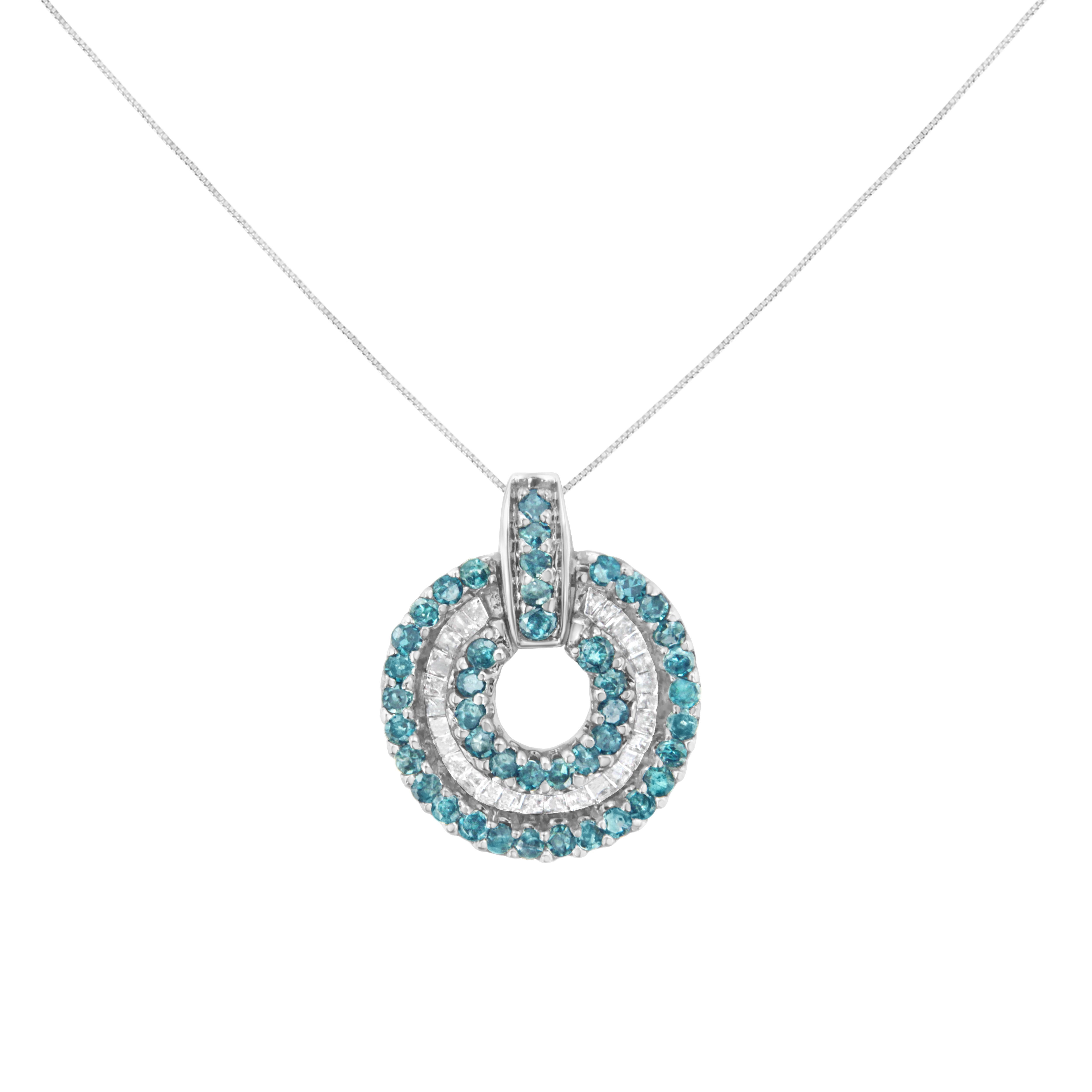 This stunning 14k white gold pendant necklace features a stunning circular design. The pendant boasts an outer circle of sparkling round-cut, treated blue diamonds, followed by channel-set, baguette-cut natural diamonds, and then another circle of