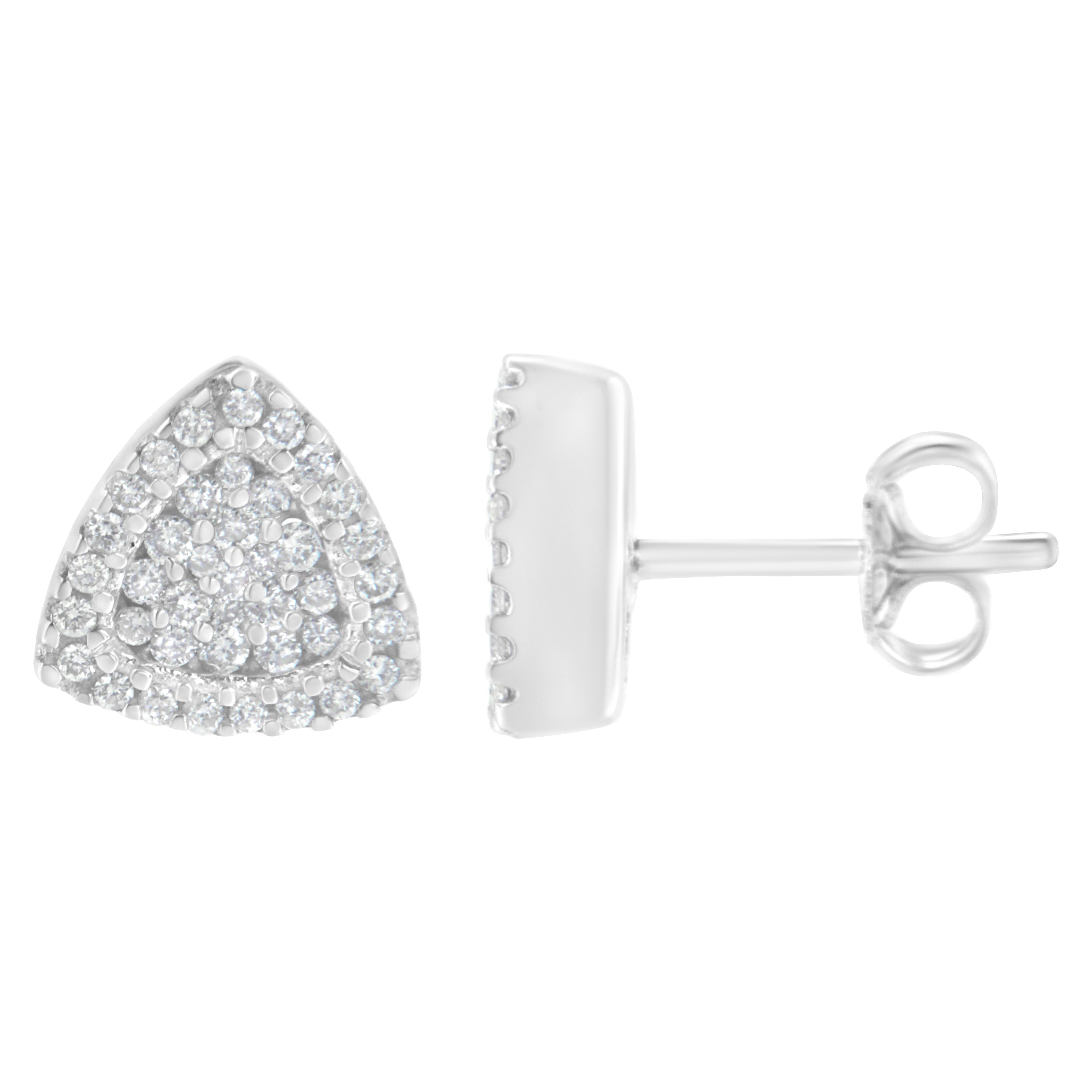 Let yourself be dazzled by these trillion shaped stud earrings. Made in 14k white gold, these earrings showcase 1/2 ct TDW in diamonds. A central diamond cluster is wrapped by a diamond halo. 80 round cut diamonds give this earring design its