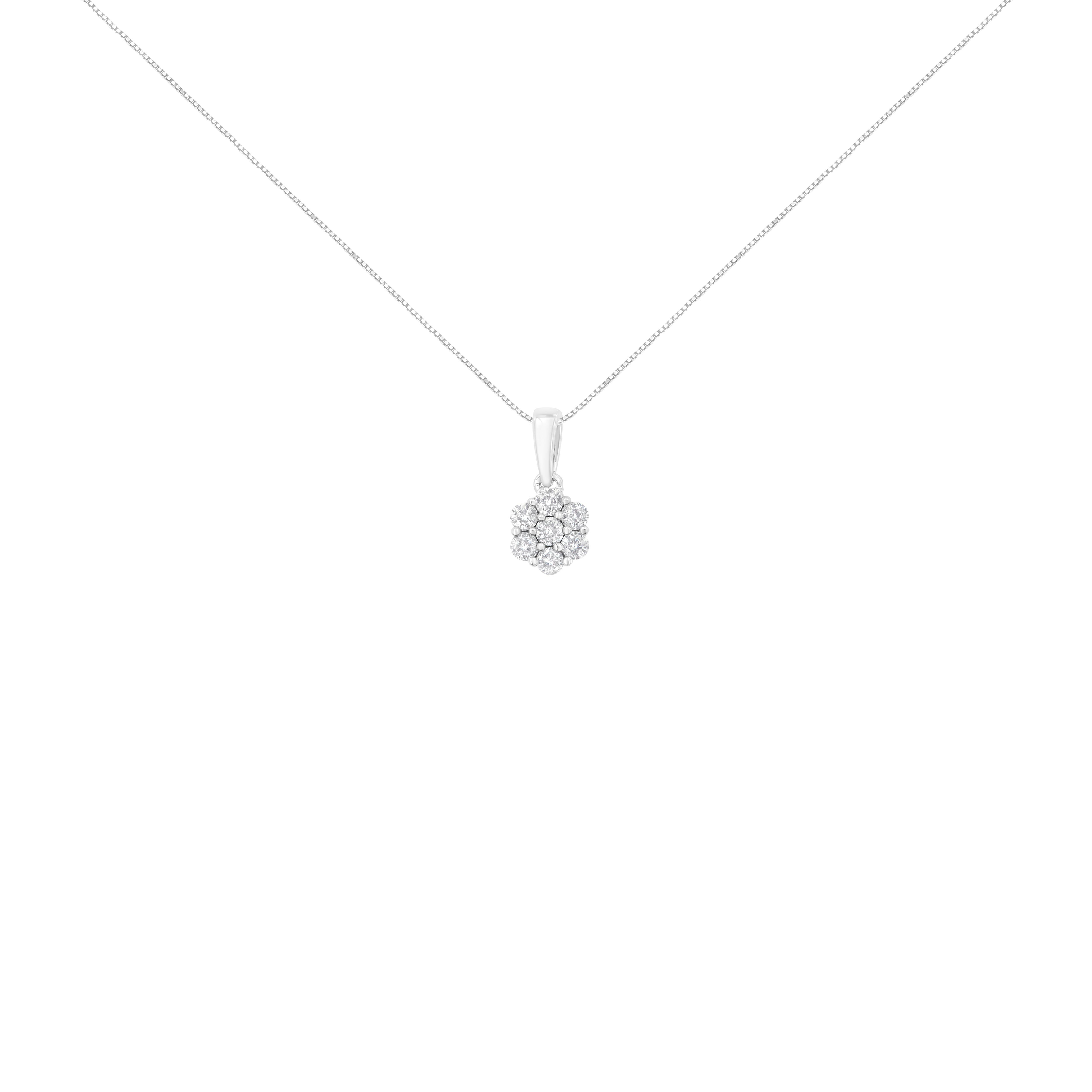 This stunning floral cluster pendant is designed with 7 natural, round-cut diamonds in a glistening prong setting. Designed in the finest 14k white gold, this necklace boasts 1/2 ct tdw. This is the perfect accessory for any night out.

Product