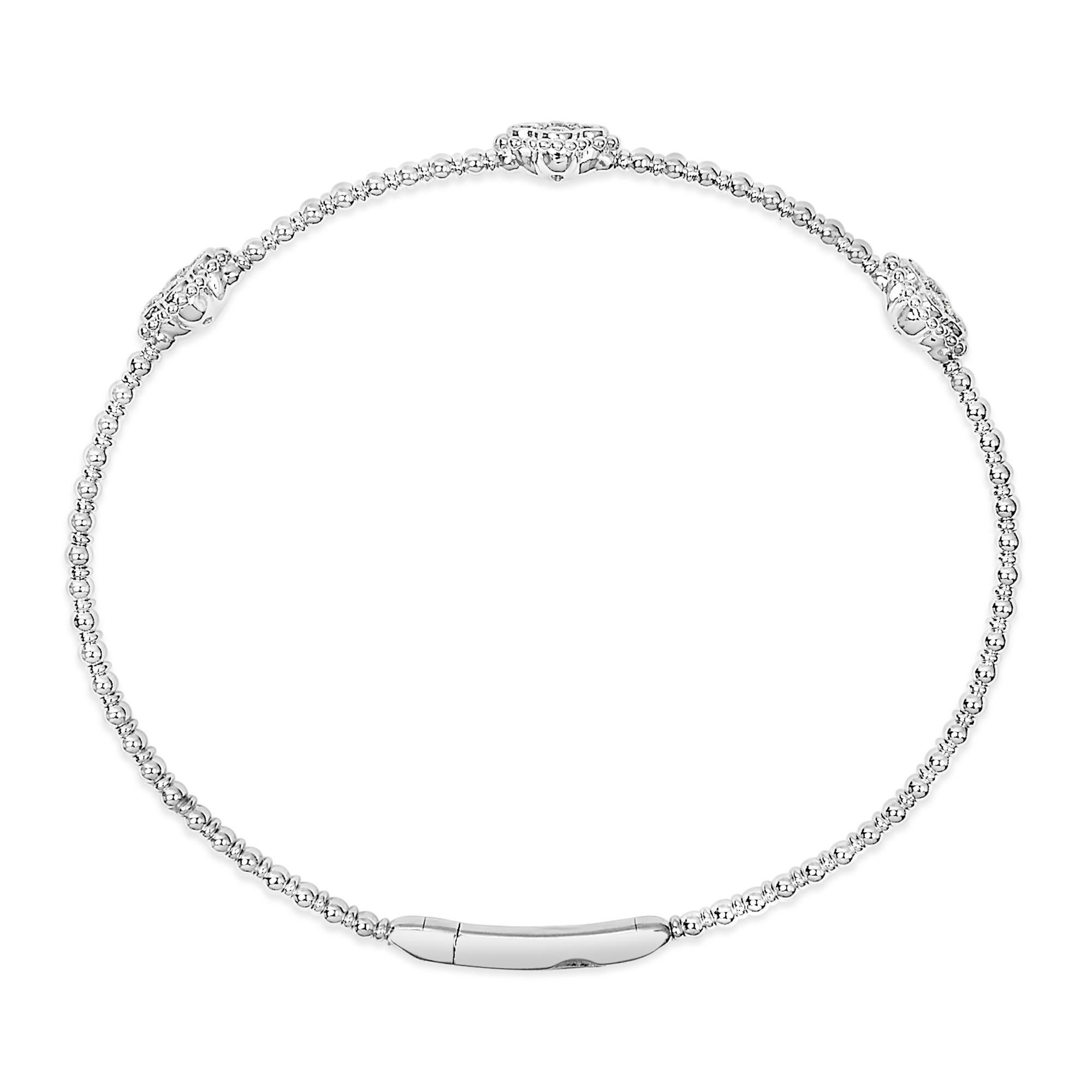 Modern 14K White Gold 1/2 Cttw Diamond Quatrefoil Clover Style Bangle Bracelet For Sale