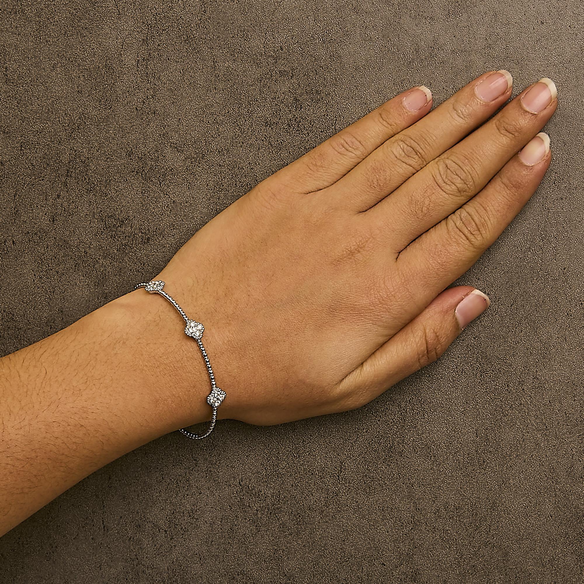 Round Cut 14K White Gold 1/2 Cttw Diamond Quatrefoil Clover Style Bangle Bracelet For Sale