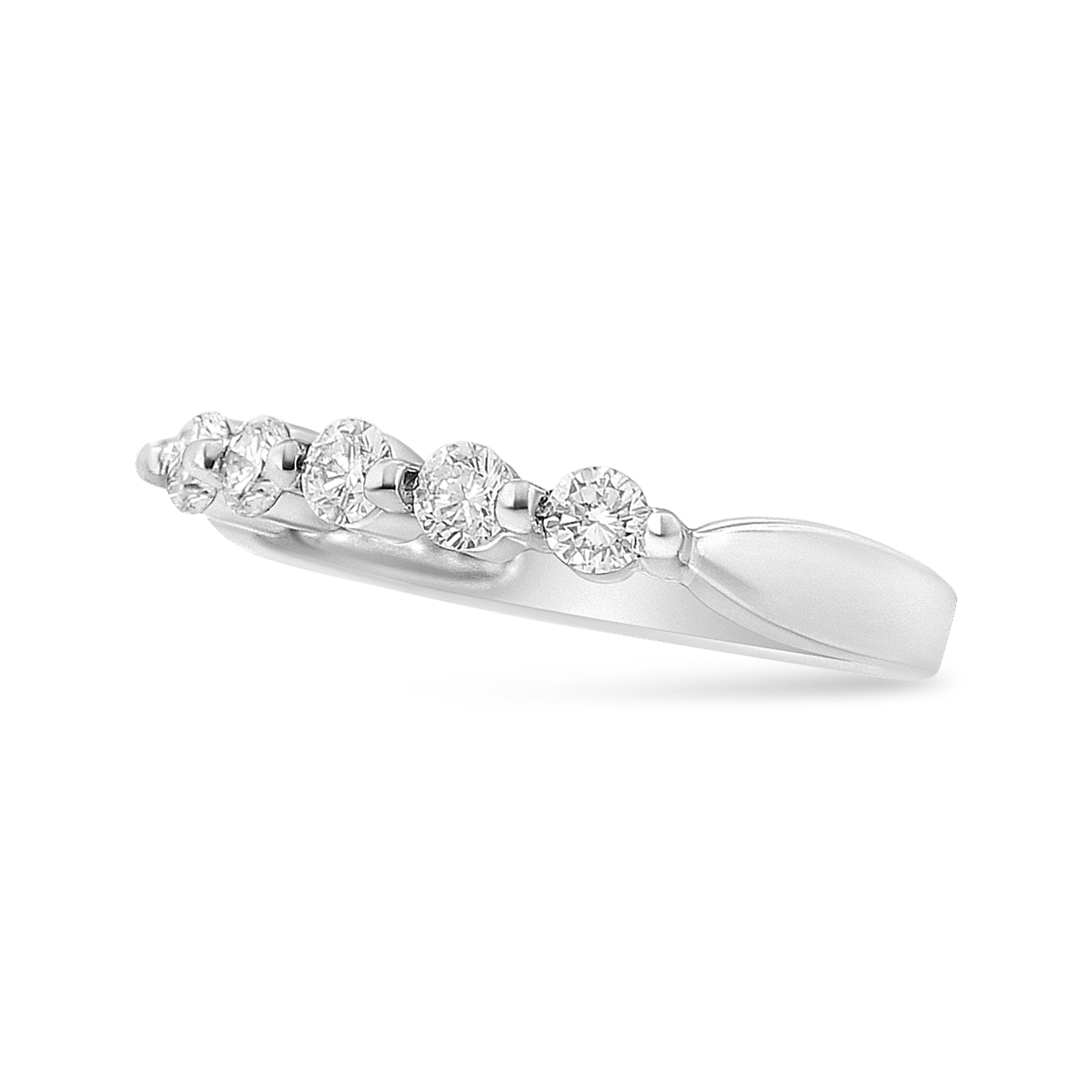 Timelessly designed, this petite and elegant ring is set with 5 natural diamonds in a unique pave setting. The diamonds are round-cut with an SI1-SI2 clarity. The total carat weight is 1/2 c.t., adding a touch of glamour to your look! The band is