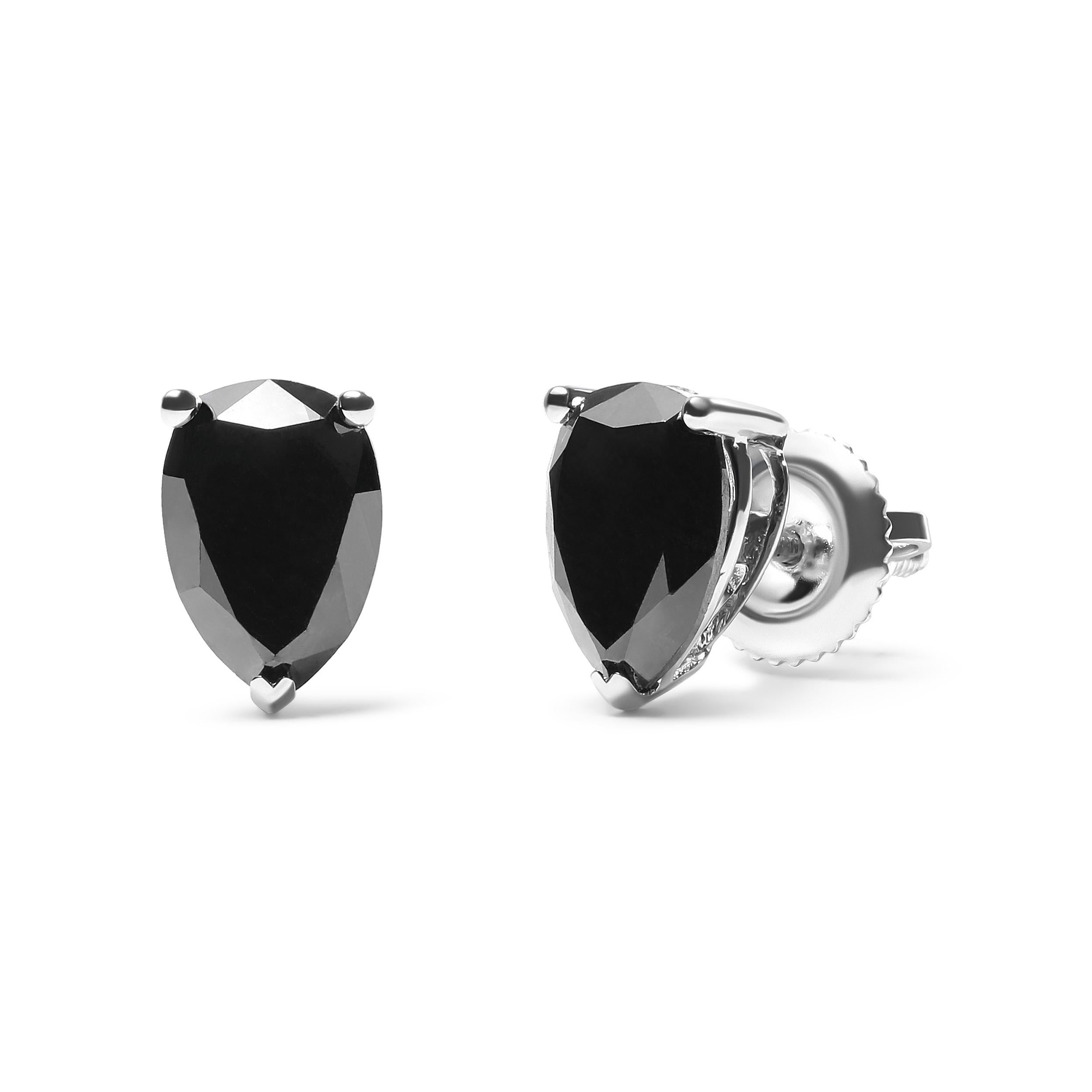These gorgeous natural diamond solitaire earrings are a classic and timeless design that will be one of your favorite looks to wear. Pear-shaped color treated black diamonds dazzle with faceted splendor from 3-prong settings, totaling 1/2 cttw and