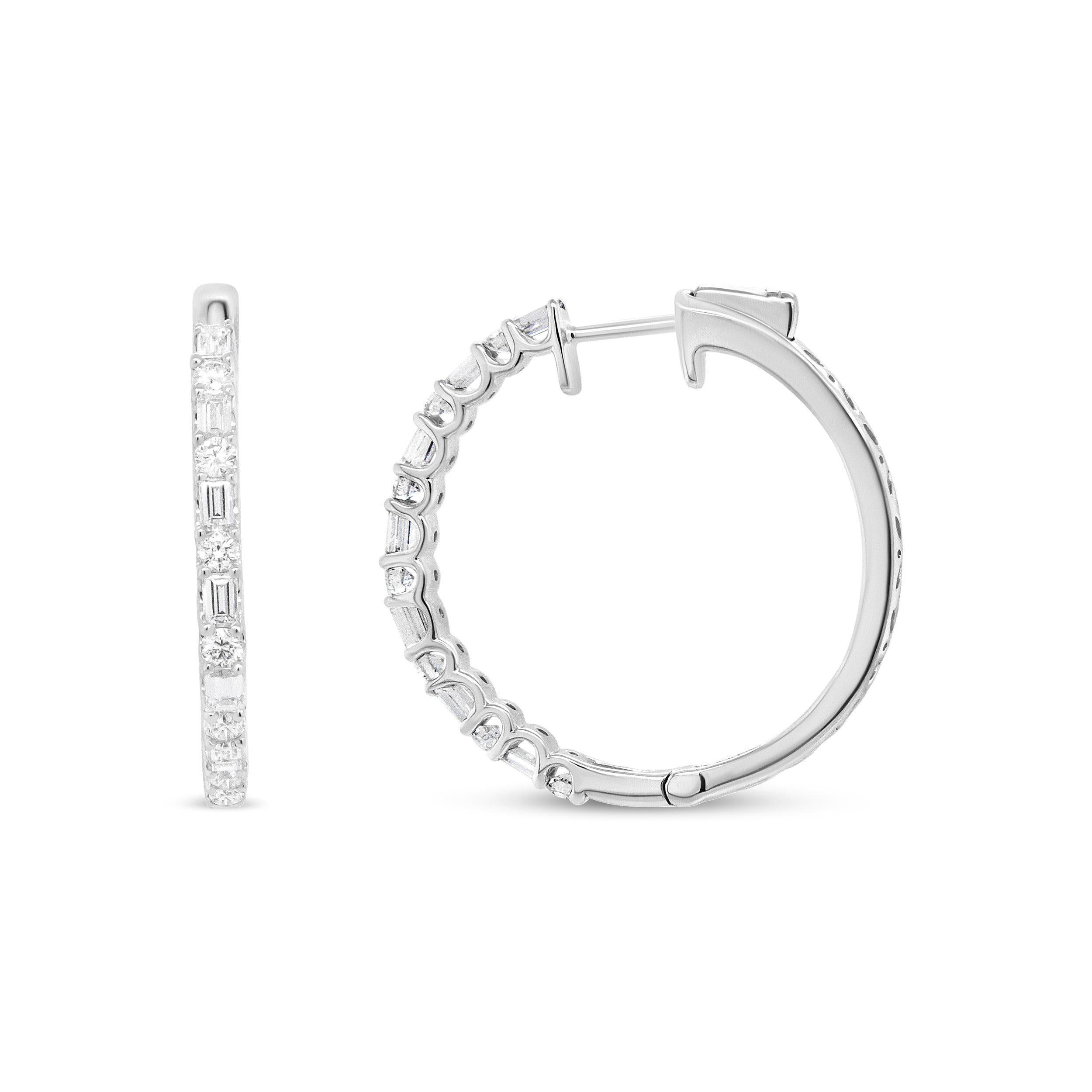 Bask in the sparkle of this pair of diamond hoop earrings crafted from genuine 14k white gold, which is a metal that will stay tarnish free for years to come! An alternating pattern of round and baguette diamonds dazzle from their prong settings,