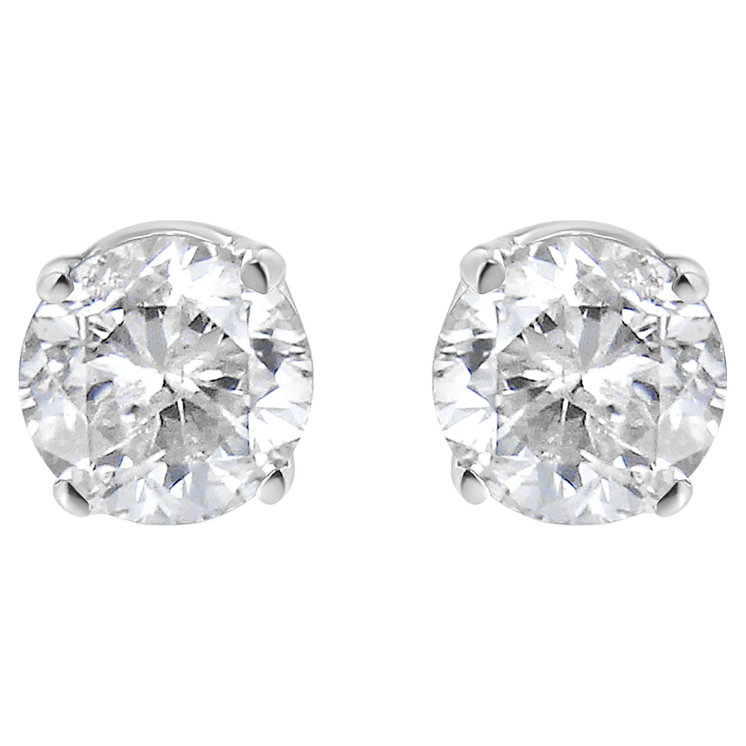 Clous d'oreilles solitaires en or blanc 14 carats avec diamants de 1/3 carat