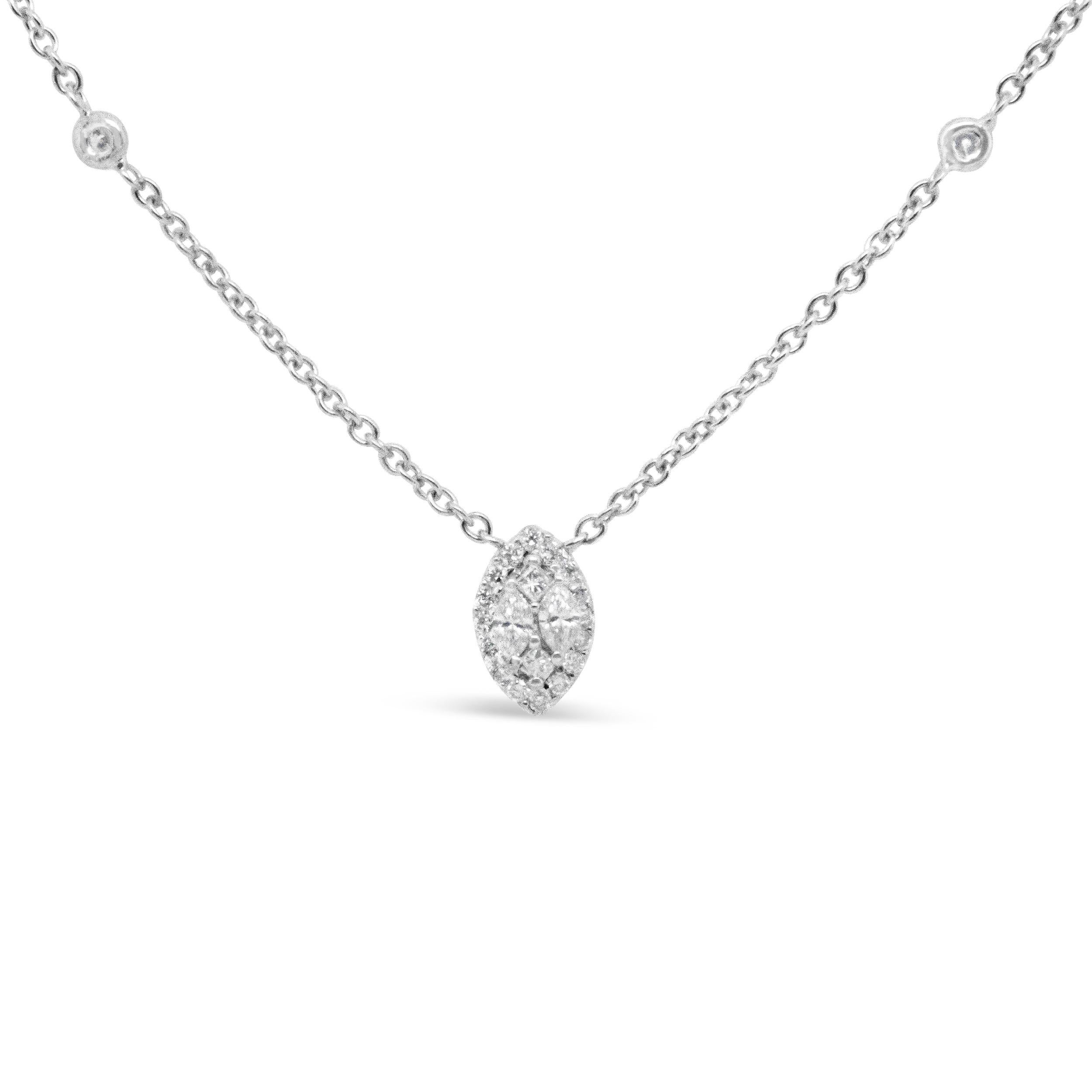 There is an excellent air of sophistication around this gorgeous diamond station necklace crafted from genuine 14k white gold. Interspersed with sparkling bezel-set stones along the sides, the eye-catcher of this spectacular necklace is the dazzling