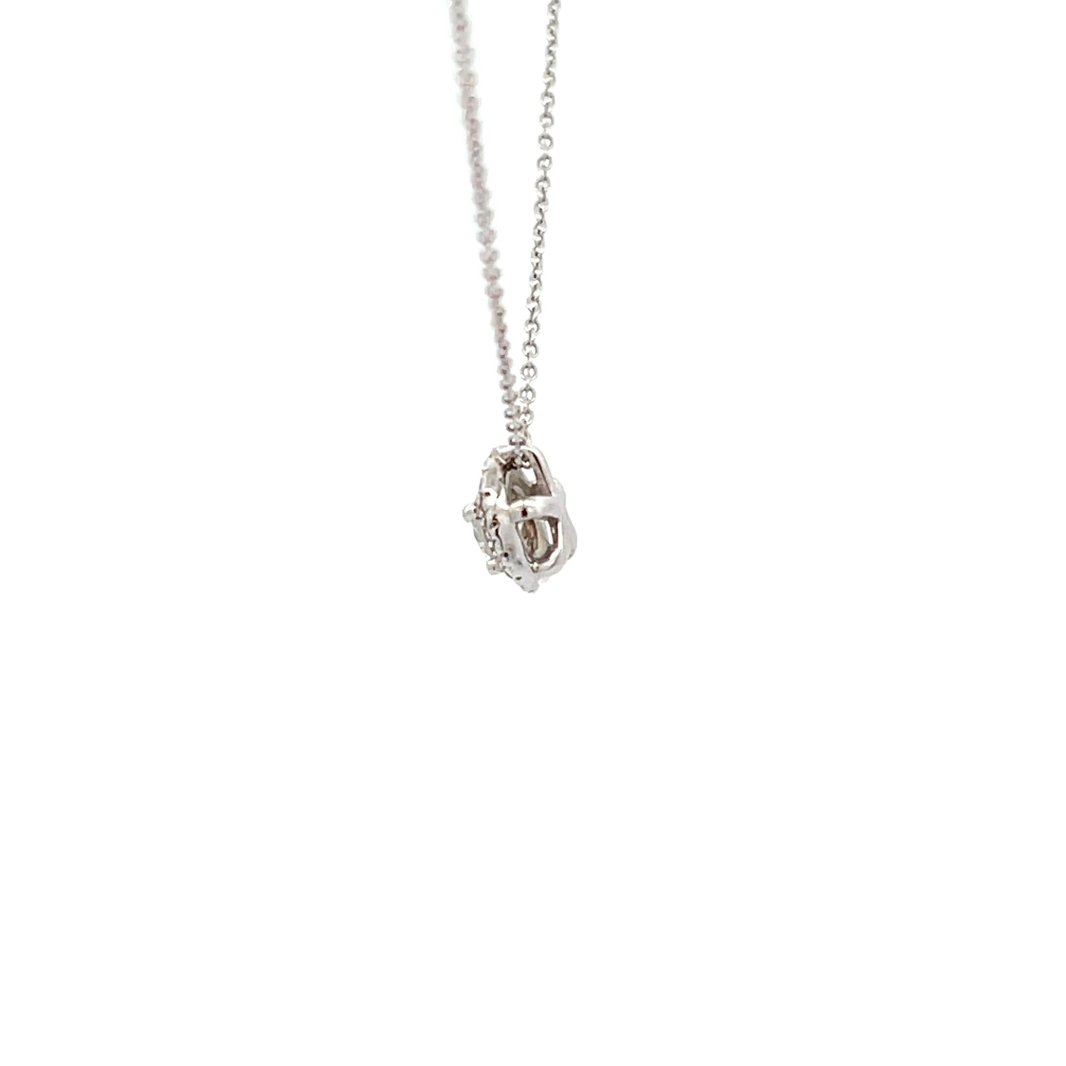 Introducing our exquisite 14K White Gold 0.30ctw Diamond Framed Pendant, a captivating piece that effortlessly blends sophistication with timeless beauty. Crafted with meticulous attention to detail, this pendant is sure to become an alluring