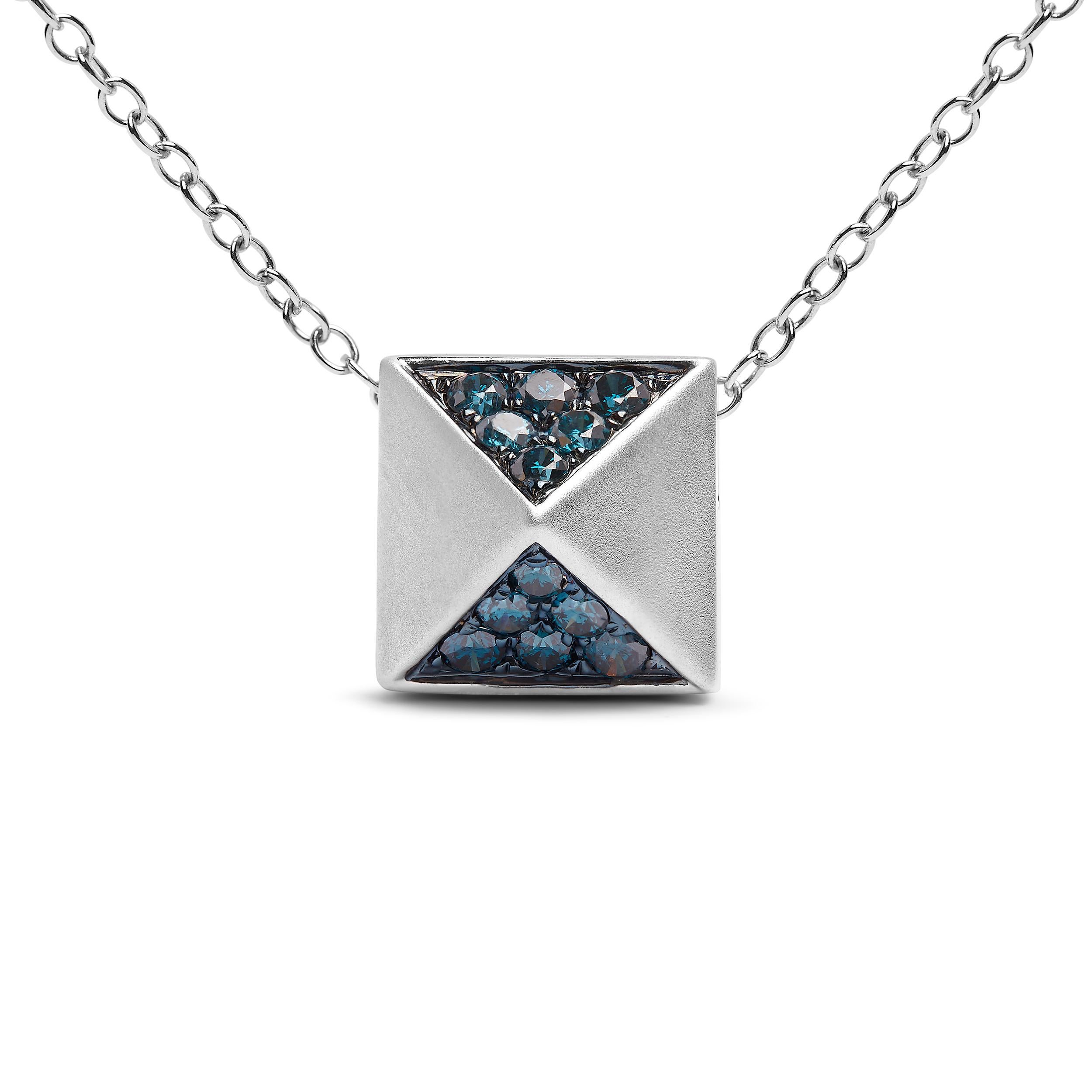 Découvrez la mystique des profondeurs de l'océan dans ce pendentif pyramidal en or blanc 14 carats, où l'attrait des diamants bleus rehaussés rencontre un design innovant. Chaque pierre précieuse, d'origine naturelle et méticuleusement traitée pour