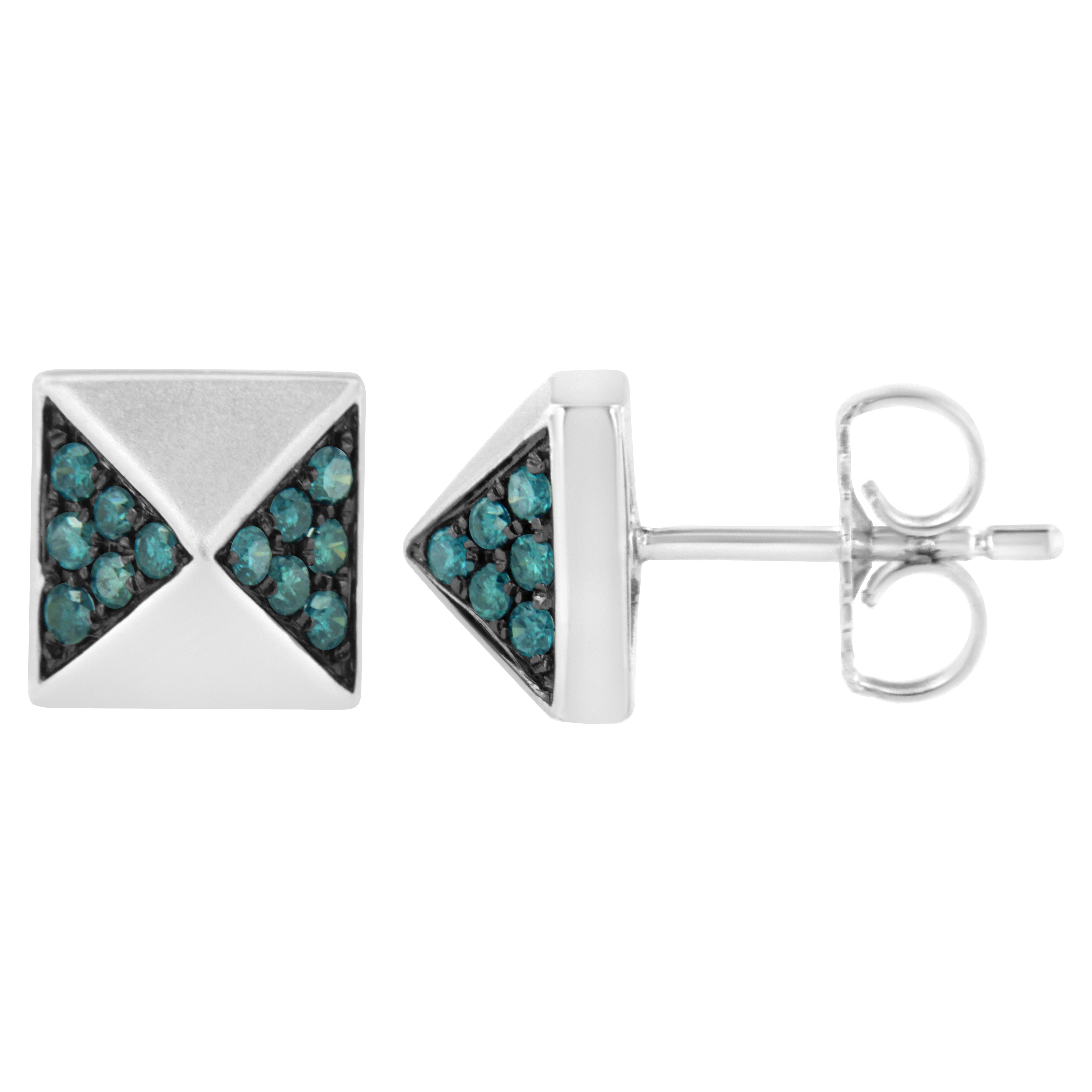 Plongez dans l'allure de ces exquises boucles d'oreilles en or blanc rhodié 14 carats, conçues pour capturer l'essence de la sophistication moderne grâce à leur silhouette géométrique pyramidale. Ces clous d'oreilles sont magnifiquement incrustés de