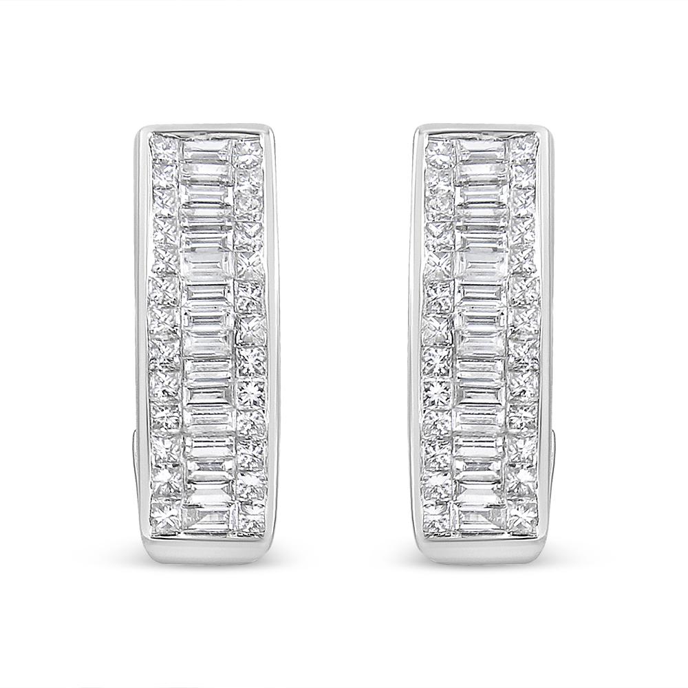 These gorgeous 14k white gold huggy earring are designed in a rectangular shape and feature a glimmering row of baguette cut diamonds framed by two rows of invisible set princess cut diamonds. 2ct TDW of diamonds stand out in this design. An omega