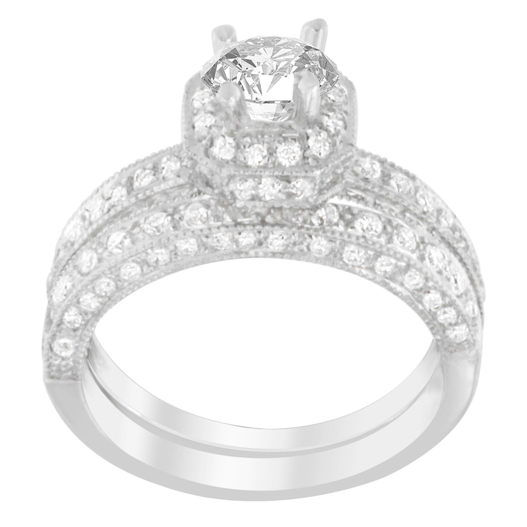 Bague en or blanc 14KT avec diamants et pierres naturelles. Les magnifiques diamants sont de taille ronde et sont disposés en serti clos. Le design chic et arrondi est intemporel et constitue un merveilleux cadeau ou un ajout à votre collection de