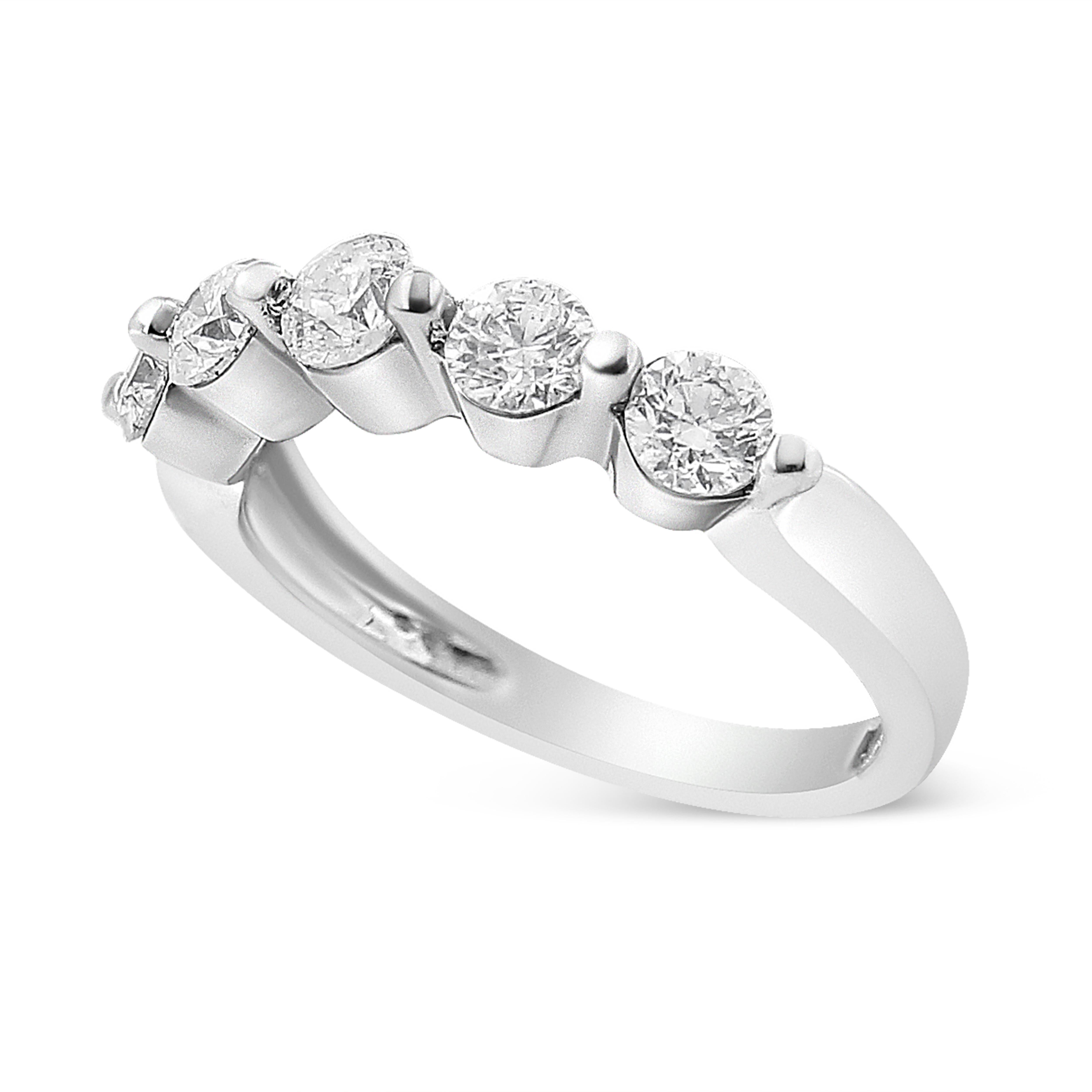 Why only get one diamond when you can have five? Featuring five brilliant round-cut diamonds, the ring shines bright like no other. Set in 14K white gold, take a closer look at each natural stone and you’ll notice that they’re set in a two-prong