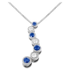 14K White Gold 1.0 Carat Treated Blue Diamond Journey Pendant Necklace