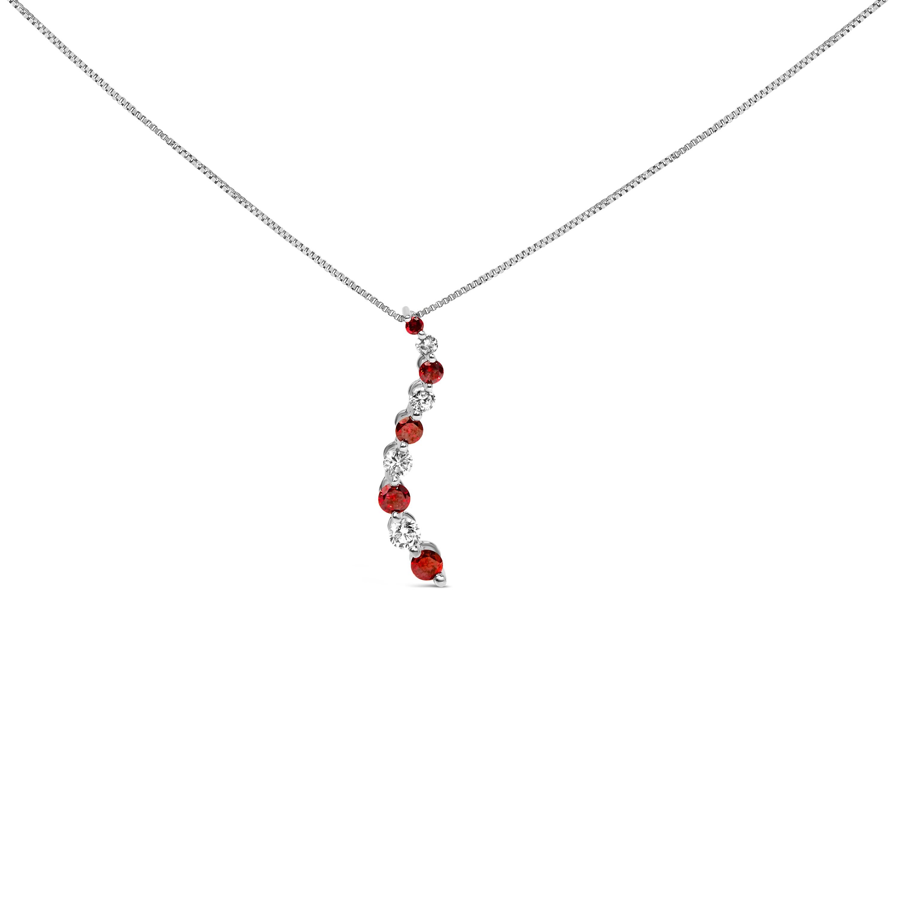 Exquisite and evocative, this rhodium-plated 14K white gold pendant necklace embodies a journey not just of design, but of emotion, intertwining ten round natural diamonds in a graceful crescendo from subtlety to statement. The artful progression of
