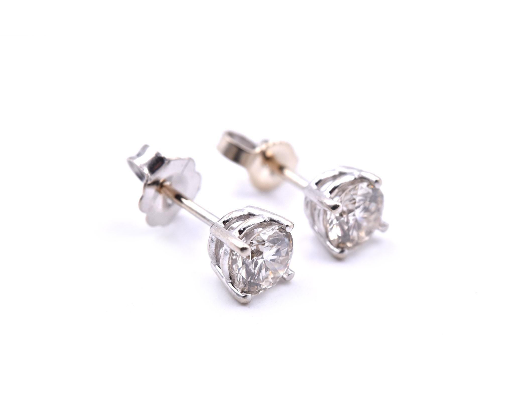 
Designer: custom design
Material: 14k white gold
Diamonds: two round brilliant cut = 1.00cttw
Color: I
Clarity: VS2-SI1
Dimensions: earrings are approximately 5.10mm by 5.08mm
Fastenings: post with friction-back
Weight: 1.17 grams
