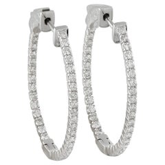 Boucles d
oreilles en or blanc 14K serties de 1,07ct diamant MF11-111825