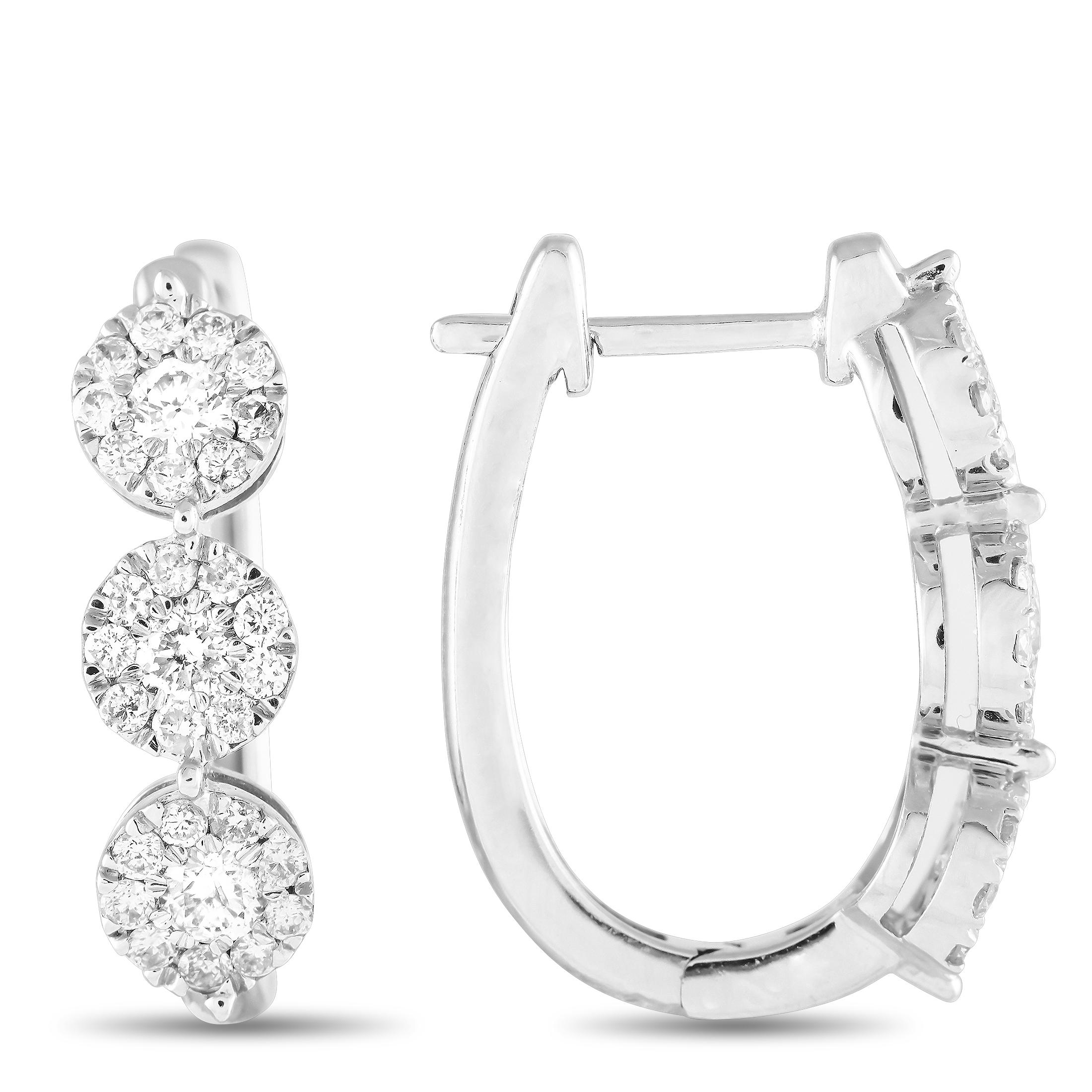 Sparkling Diamonds with a total weight of 1.0 carats allow these exquisitely crafted earrings to effortlessly catch the light. Crafted from 14K White Gold, each one features a curved setting that measures 0.75 long by 0.66 wide.This jewelry piece is