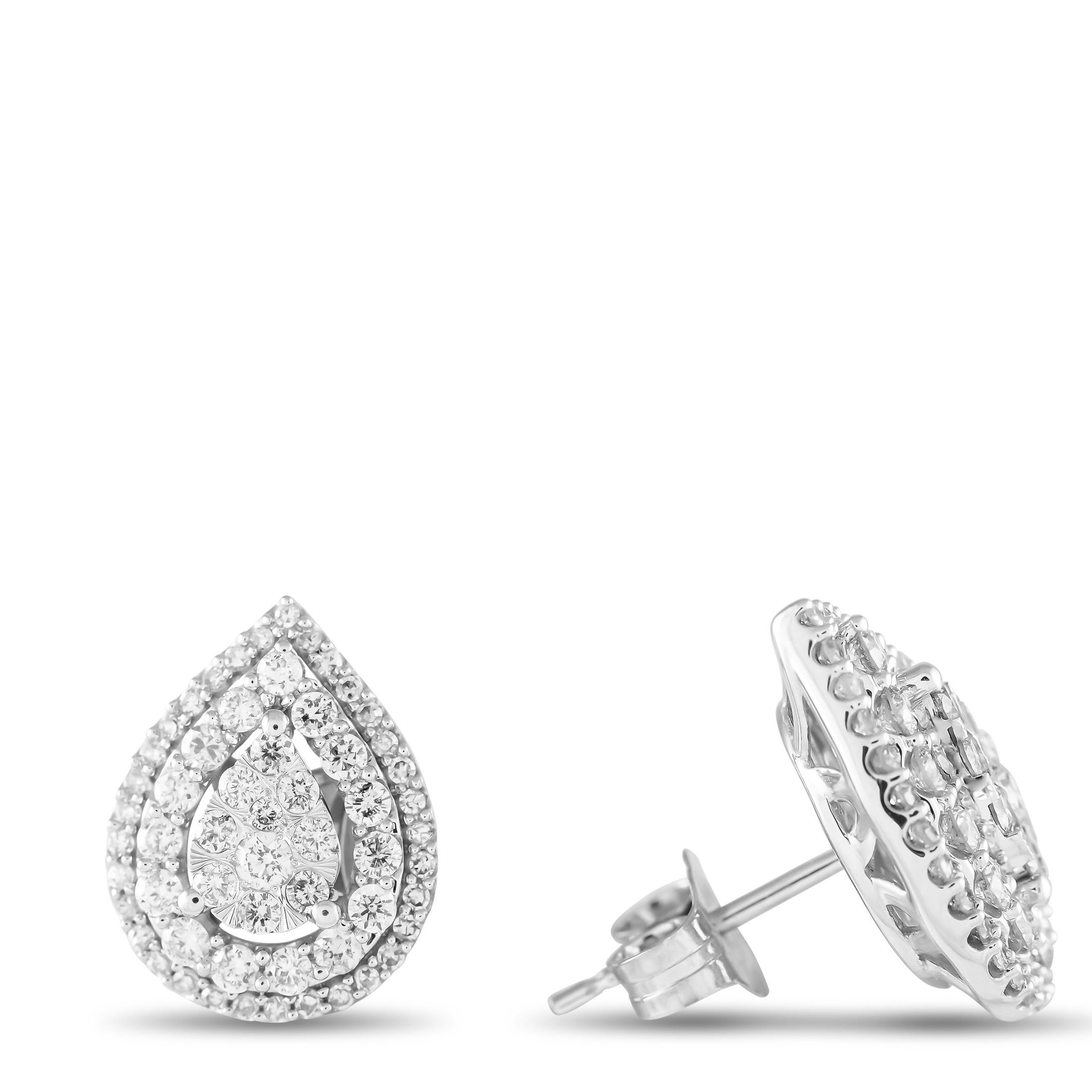 A chic, pear-shaped setting crafted from 14K White Gold serves as a stylish foundation for these impressive earrings. Adorned with Diamonds totaling 1.0 carats, each one of these exquisite earrings measures 0.5 long by 0.45 wide.This jewelry piece