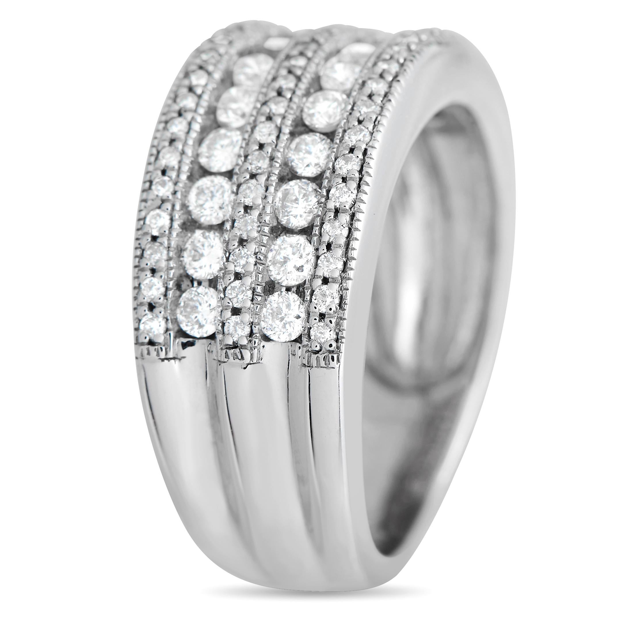 This luxurious ring is endlessly impressive. The sleek, sophisticated 14K White Gold setting is elegantly accented by rows of sparkling Diamonds with a total weight of 1.0 carats. Ideal for any occasion, it features a 5mm wide band and a comfortable