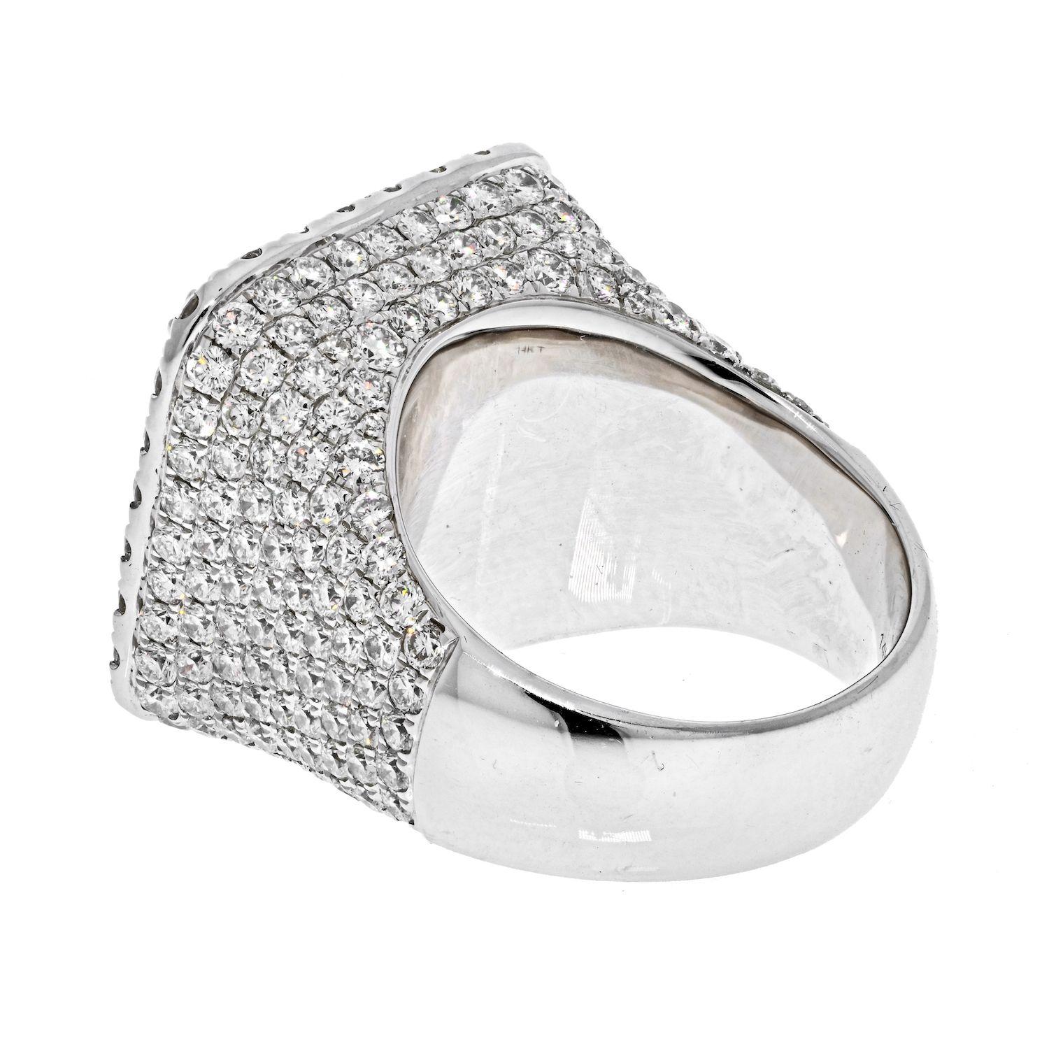 This is a high quality diamond ring for men. Crafted in 14k white gold mounted with significant size diamonds that are all clean and inclusions free. You will know what we mean when you see this ring in person. 
Brilliant from every angle this