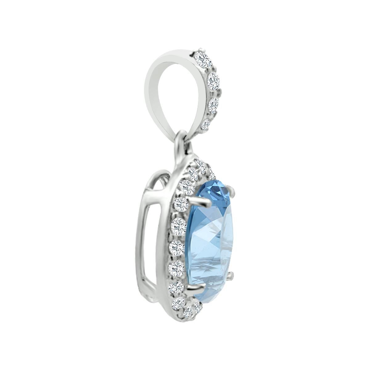 Create An Aura Of Elegance With this Lovely Oval - Cut Aquamarine And Diamond Halo Pendant. 
A Beautiful 8x6mm Oval Cut Aquamarine Is Dressed Up With A Diamond Accent In This Elegant Pendant. This Pendant Is Set In 14K White Gold.
Too Beautiful For