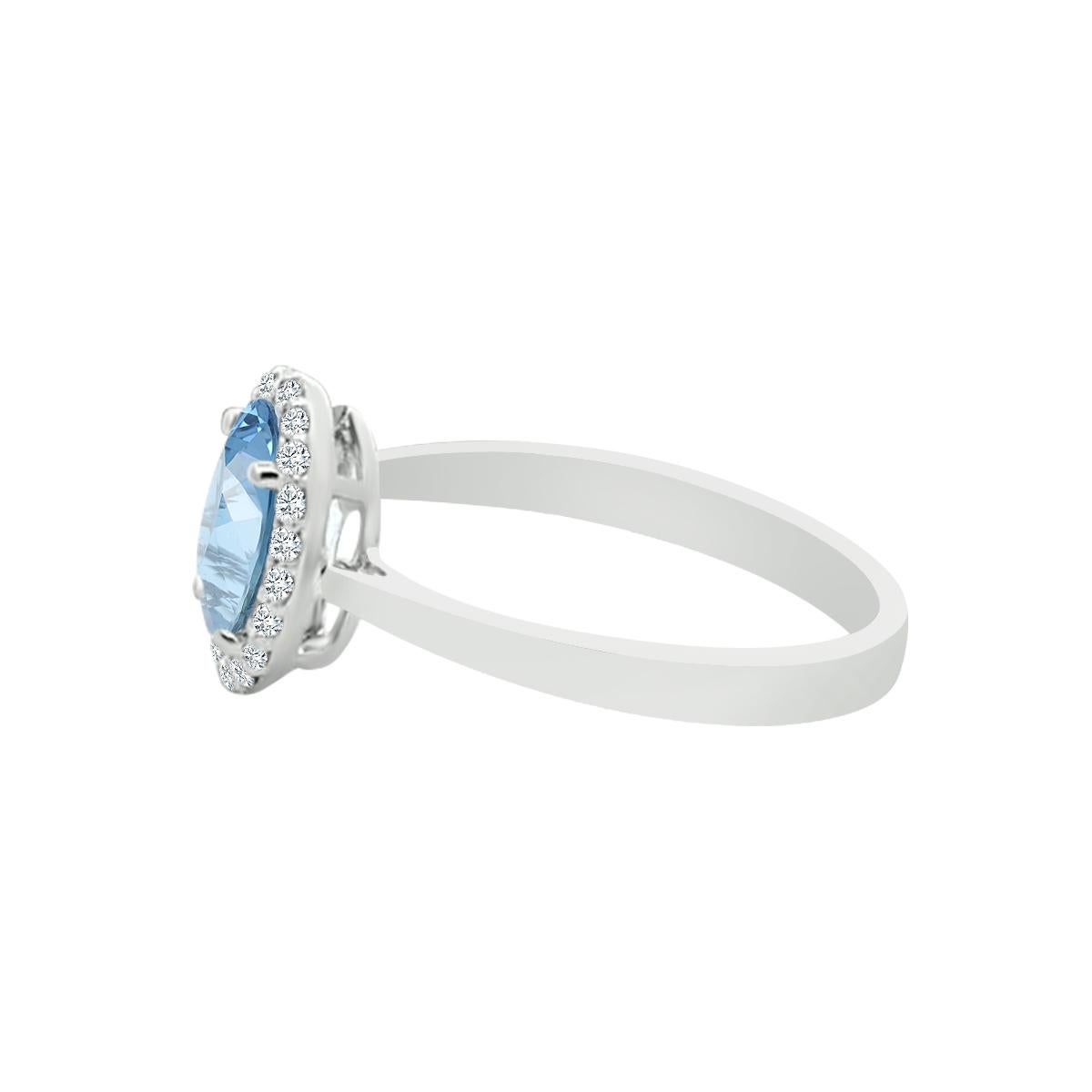The Light Blue Aquamarine Women's Fashion Ring Will Turn Heads.
The Beautiful Fashion Ring Has One 8x6mm Aquamarine Gemstone In Oval Cut Adorned By Sparkling Diamonds Around It.
This Ring Is Crafted In 14K White Gold And This Beautiful Aqua Ring