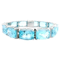 Bracciale in oro bianco 14k 112,80ctw rettangolare con cuscino di topazio blu linea grande