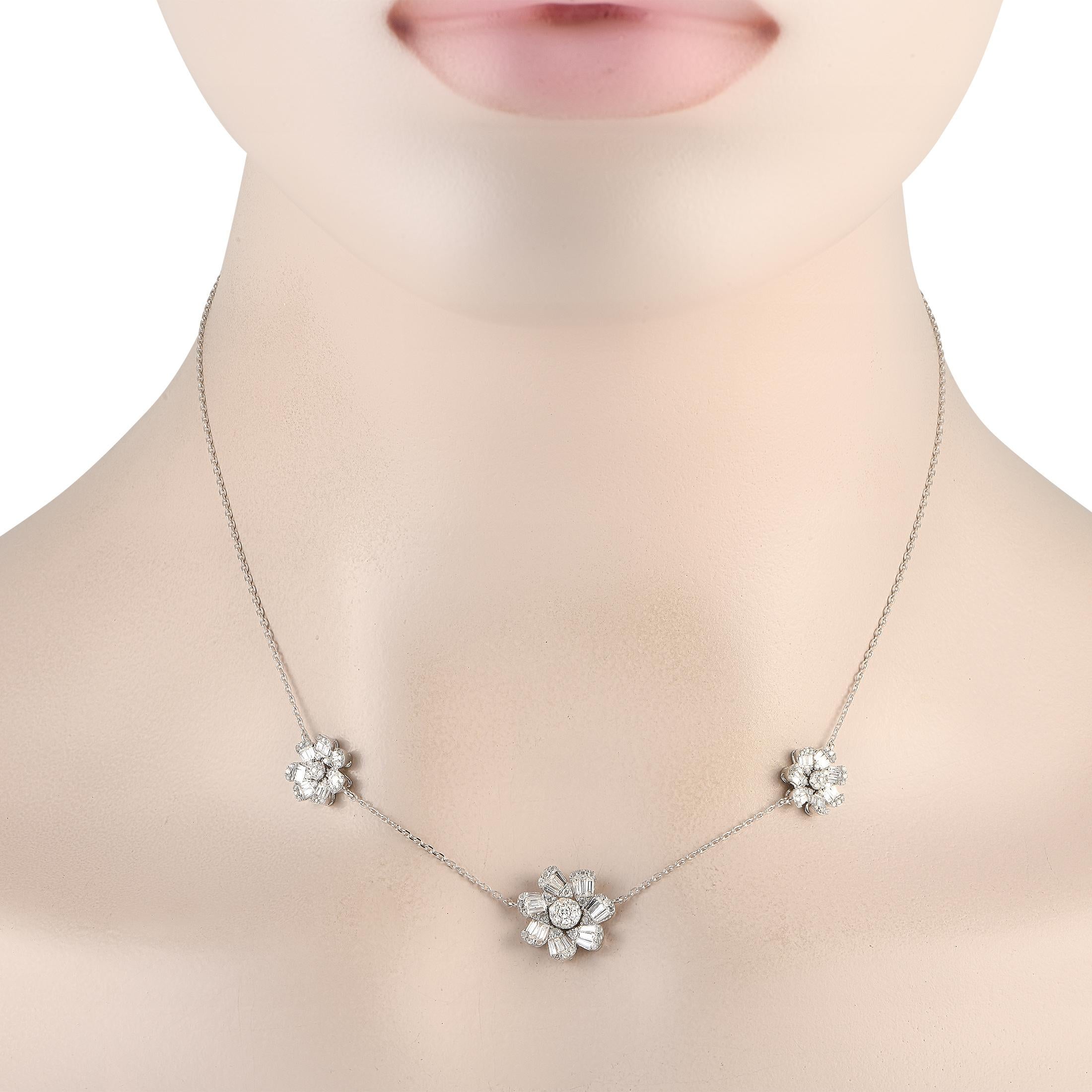 Sparkling Diamonds with a total weight of 1.20 carats allow this necklace to effortlessly emanate light. A trio of floral motifs elevate the 15 chain. Crafted from 14K White Gold, this pieces central pendant measures 0.50 round.This jewelry piece is