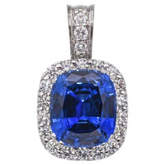 14k White Gold 12.0ct Synthetic Sapphire and 2.15tcw Diamond Halo Pendant