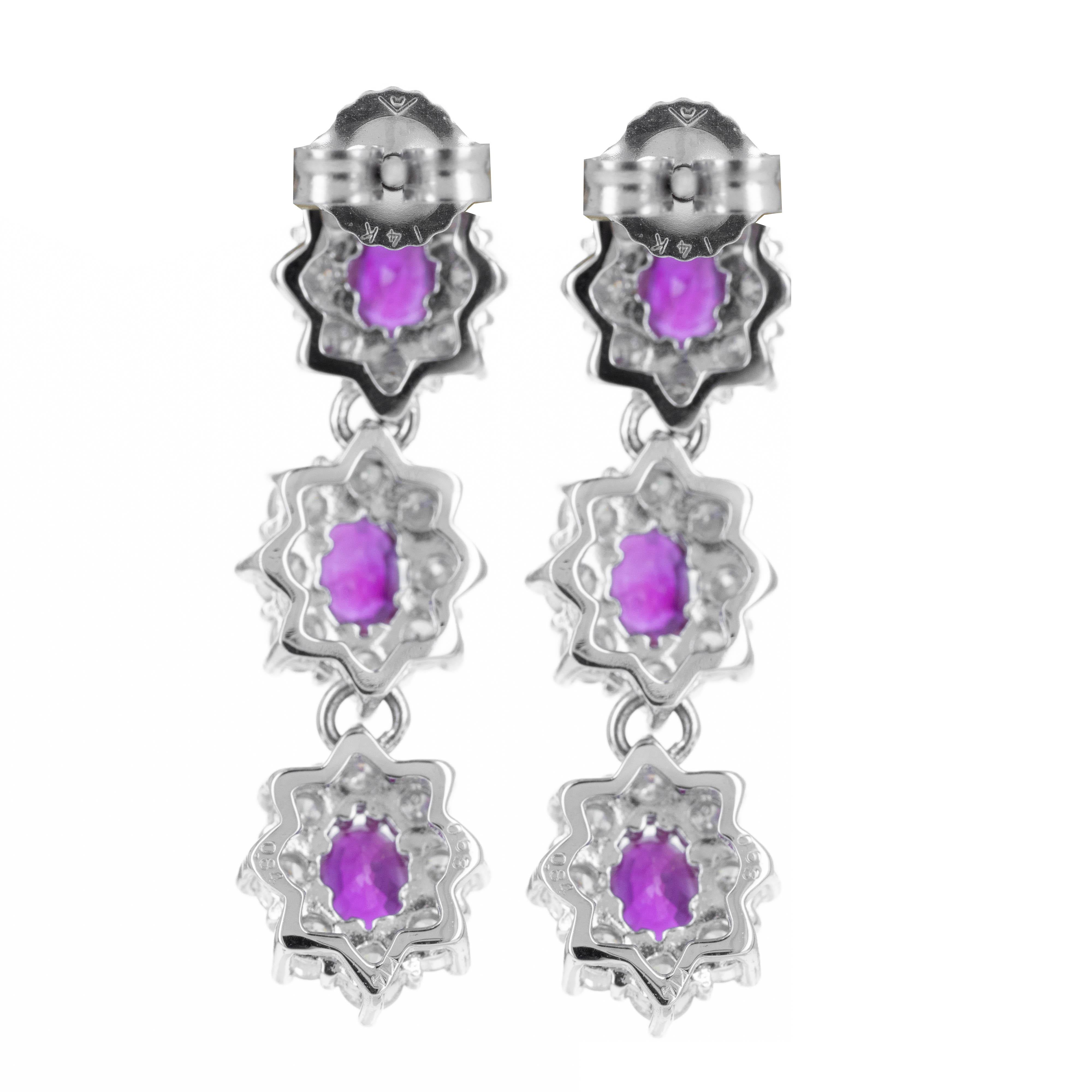 Era: New
Composition: 14K White Gold
Primary Stone: Six Oval Natural Rubies
Carat Weight: 1.26 Carats in Total
Accent Stone: Forty Eight Round Brilliant Diamonds
Carat Weight: 1.68 Carats in Total
Color/Clarity: G-H / SI1-2
Earring Dimensions: 1